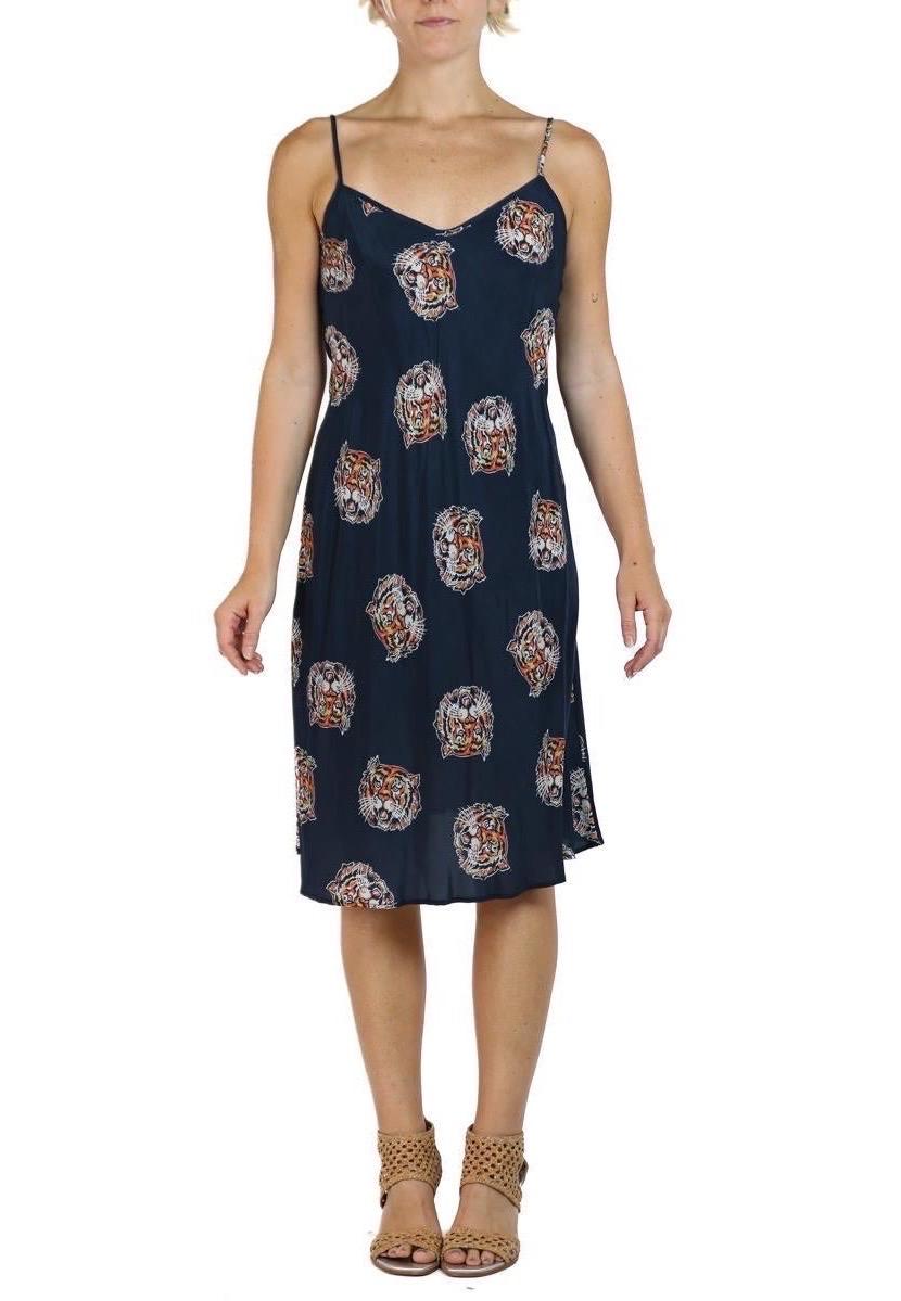 Morphew Collection Navy Tiger Head Print Cold Rayon Bias Maxi Slip Dress
MORPHEW COLLECTION is made entirely by hand in our NYC Ateliér of rare antique materials sourced from around the globe. Our sustainable vintage materials represent over a