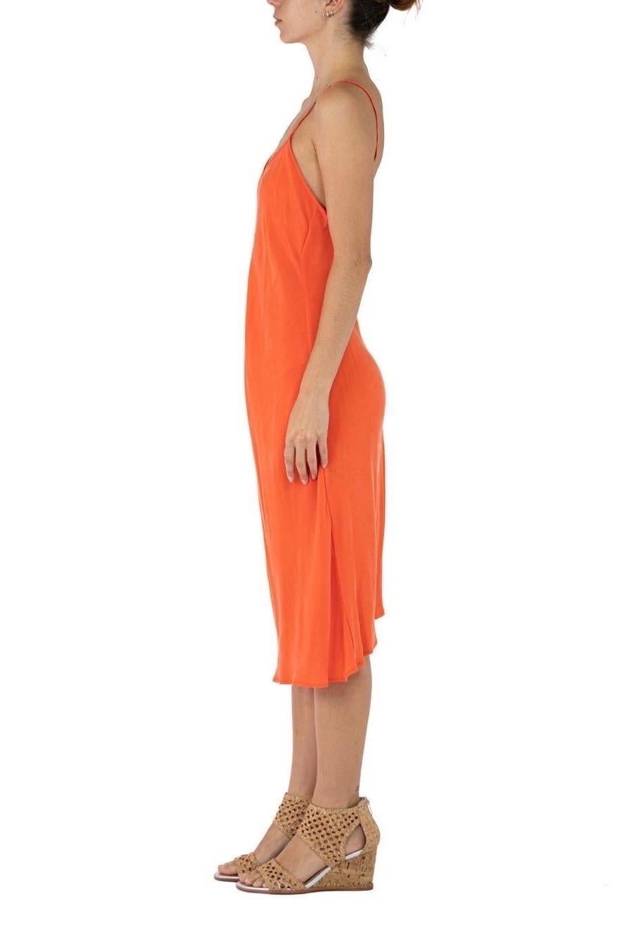 Morphew Collection Neon Orange Cold Rayon Bias Maxi Slip Dress Maxis
MORPHEW COLLECTION is made entirely by hand in our NYC Ateliér of rare antique materials sourced from around the globe. Our sustainable vintage materials represent over a century