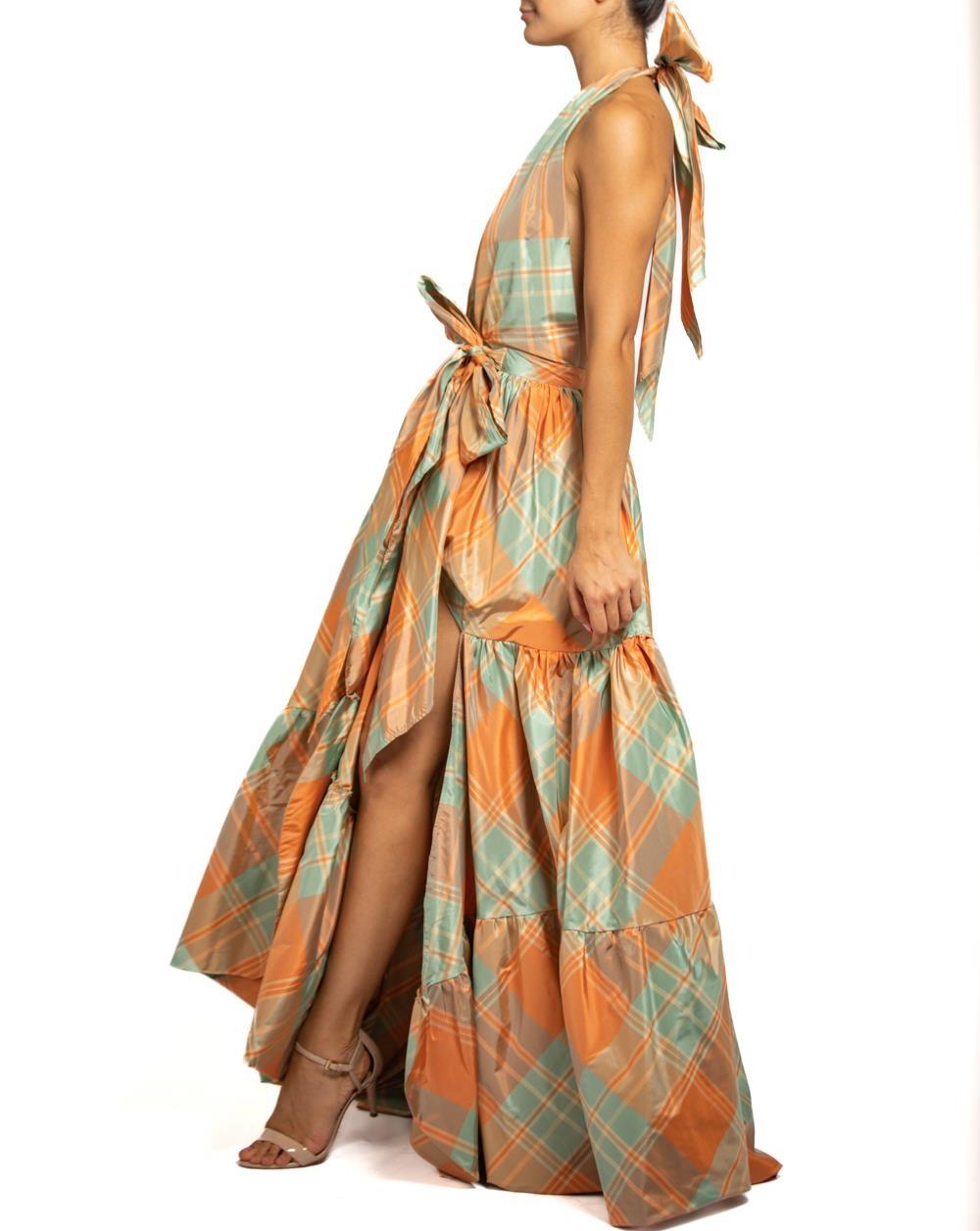 MORPHEW COLLECTION Orange & Aqua Silk Taffeta Plaid Gown MASTER
MORPHEW COLLECTION is made entirely by hand in our NYC Ateliér of rare antique materials sourced from around the globe. Our sustainable vintage materials represent over a century of
