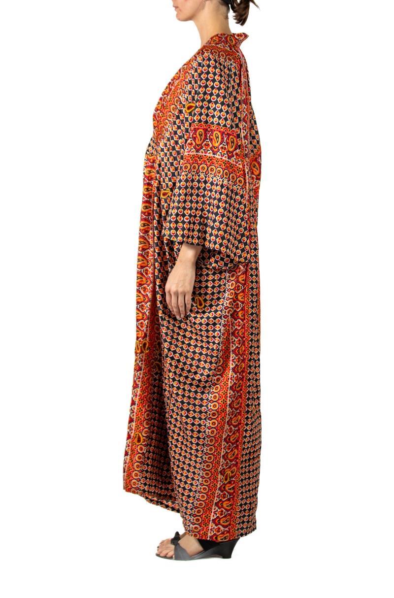 MORPHEW COLLECTION Orange & Black Indian Block Printed Silk Butterfly Sleeve Kaftan Dress
MORPHEW COLLECTION is made entirely by hand in our NYC Ateliér of rare antique materials sourced from around the globe. Our sustainable vintage materials
