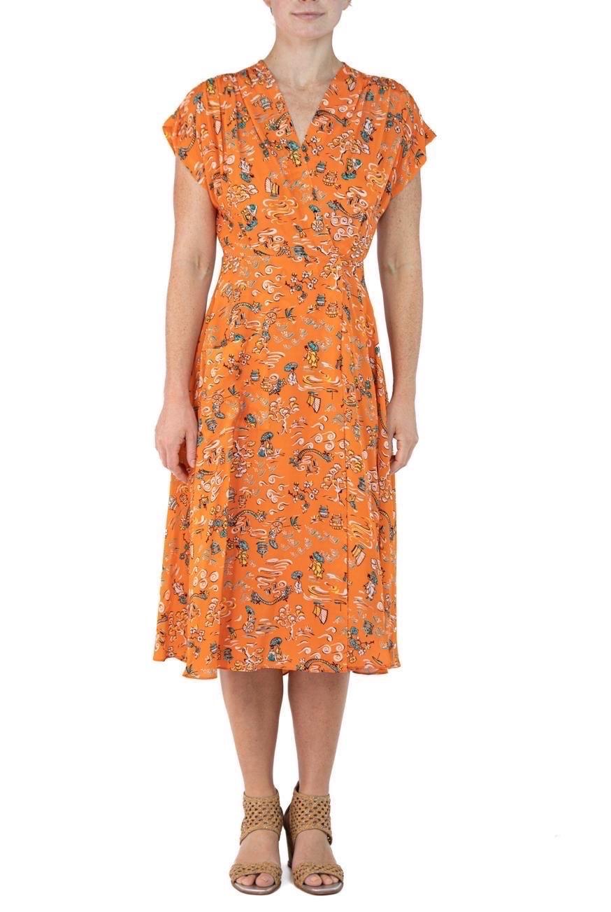 Morphew Collection Orange Cherry Blossom Novelty Print Cold Rayon Bias Dress Master Medium
MORPHEW COLLECTION is made entirely by hand in our NYC Ateliér of rare antique materials sourced from around the globe. Our sustainable vintage materials