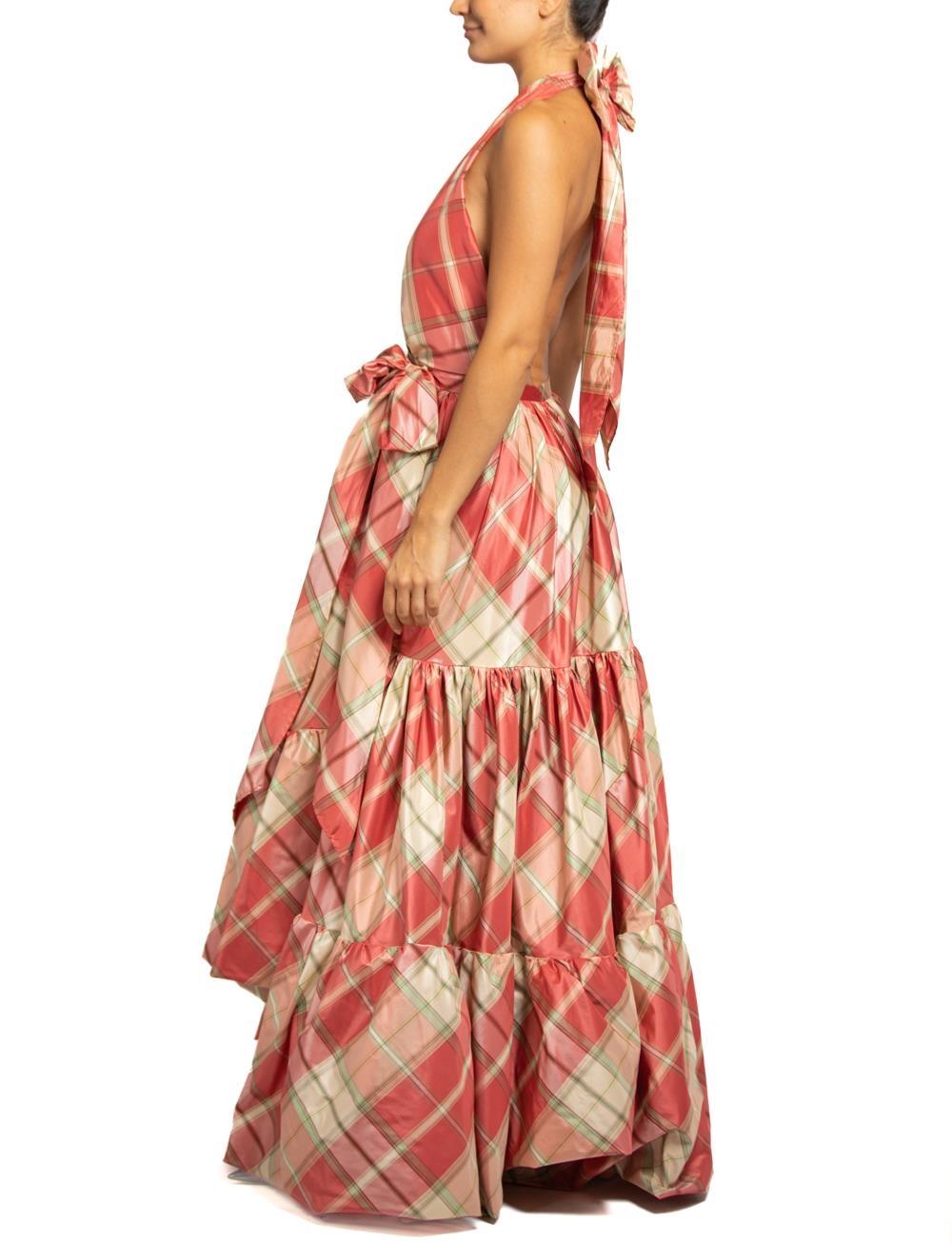 MORPHEW COLLECTION Pink & Aqua Silk Taffeta Plaid Gown MASTER
MORPHEW COLLECTION is made entirely by hand in our NYC Ateliér of rare antique materials sourced from around the globe. Our sustainable vintage materials represent over a century of