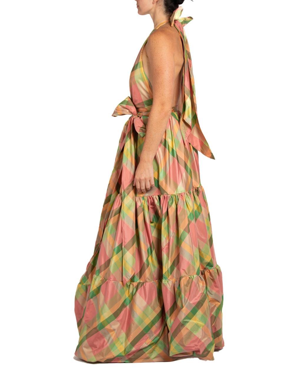 This dress fits multiple sizes from a 2 to a 12 with an adjustable waste MORPHEW COLLECTION Pink & Green Silk Taffeta Plaid Gown 
MORPHEW COLLECTION is made entirely by hand in our NYC Ateliér of rare antique materials sourced from around the globe.