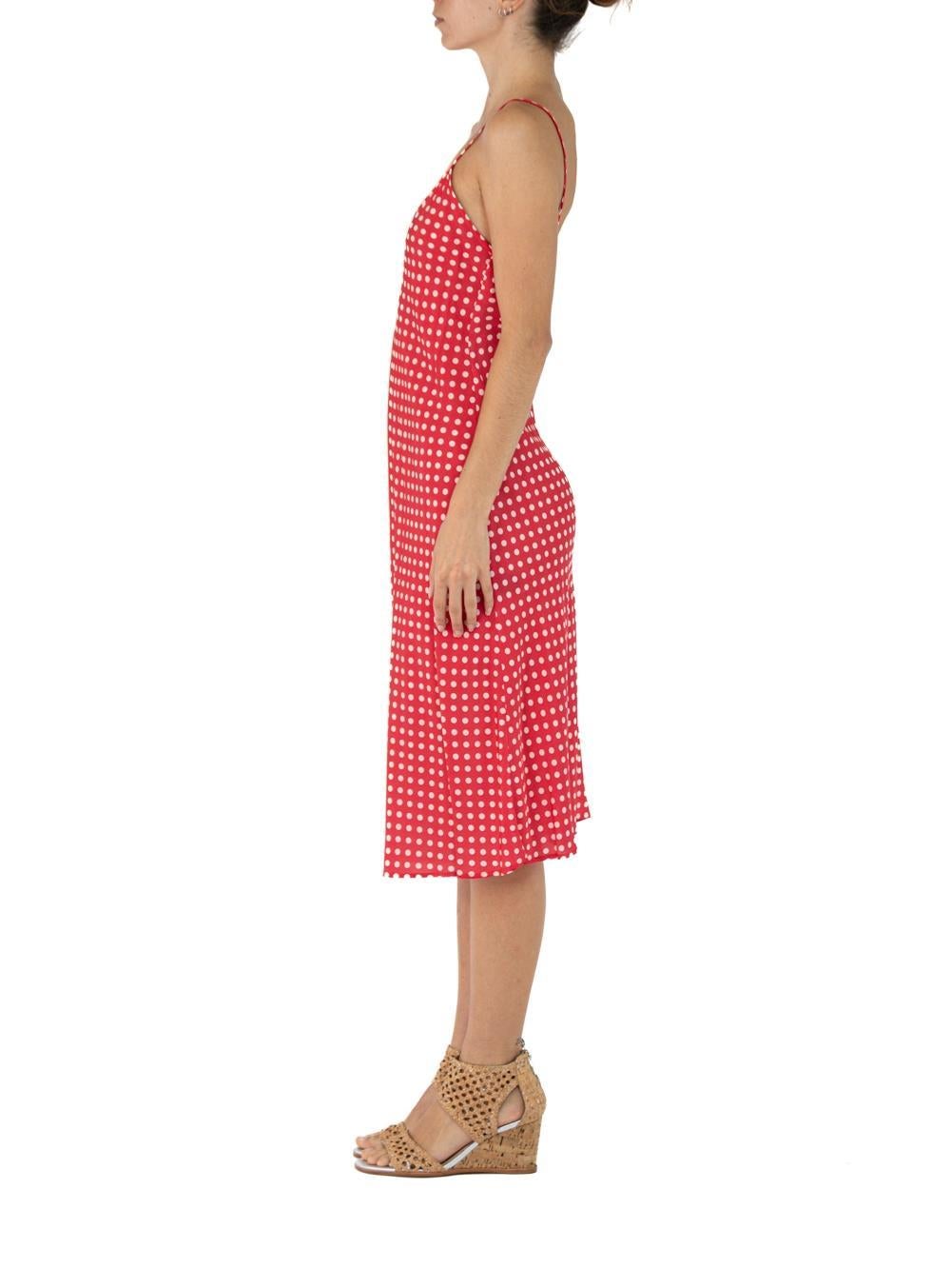 Morphew Collection Red & White Polka Dot Cold Rayon Bias  Slip Dress Master Medium
MORPHEW COLLECTION is made entirely by hand in our NYC Ateliér of rare antique materials sourced from around the globe. Our sustainable vintage materials represent