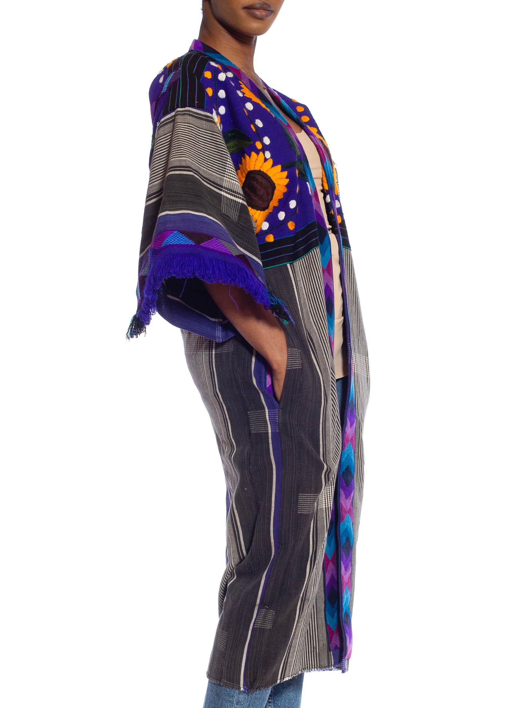 Made from up-cycled vintage fabrics so there are a few areas showing patinated wear. MORPHEW COLLECTION Royal Blue, Sunflower African Cotton Duster With Vintage Hand-Embroidered Details 
MORPHEW COLLECTION is made entirely by hand in our NYC Ateliér