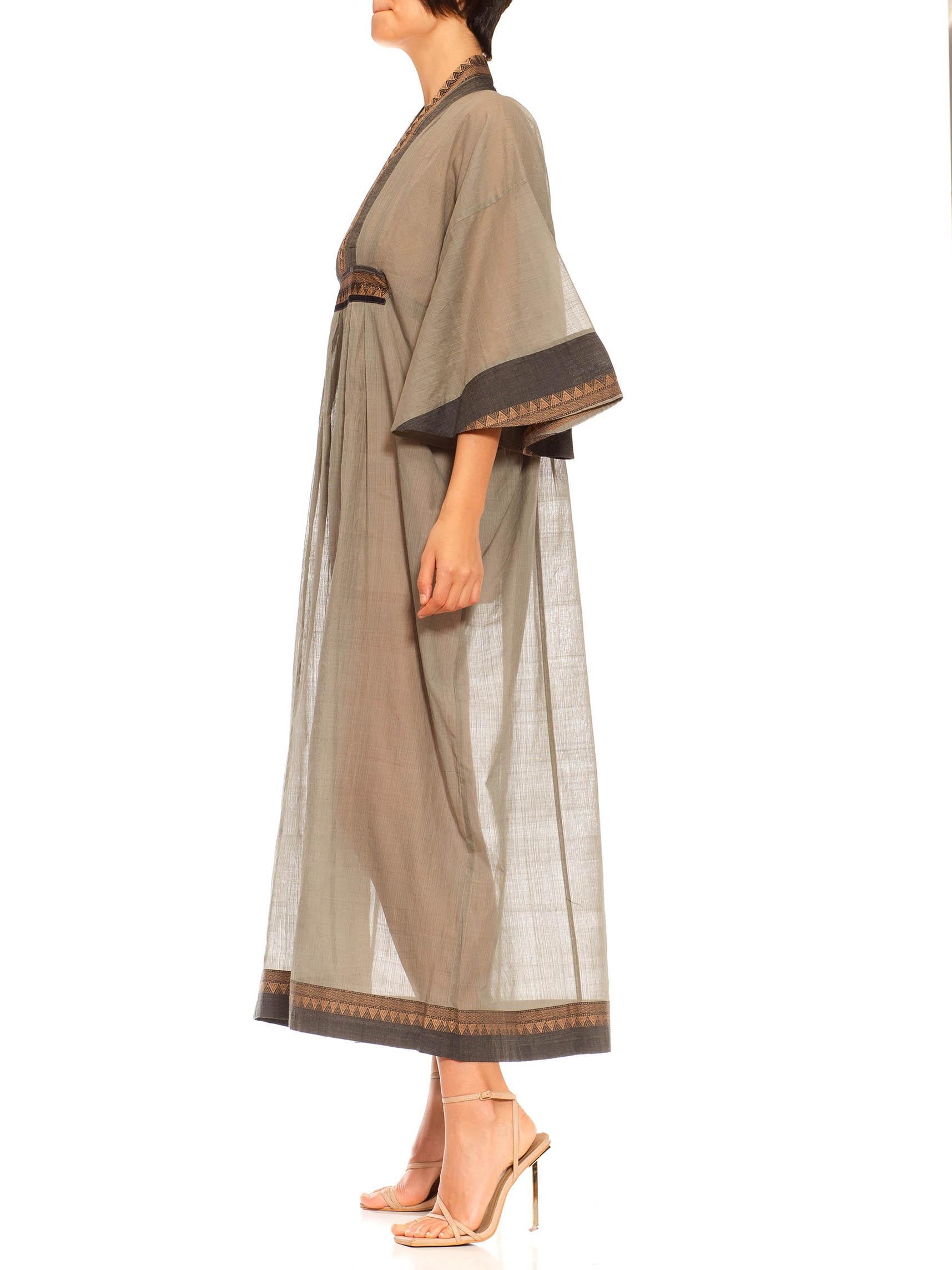 Morphew Collection Sage & Black Silk Kaftan Made From Vintage Saris
MORPHEW COLLECTION is made entirely by hand in our NYC Ateliér of rare antique materials sourced from around the globe. Our sustainable vintage materials represent over a century of