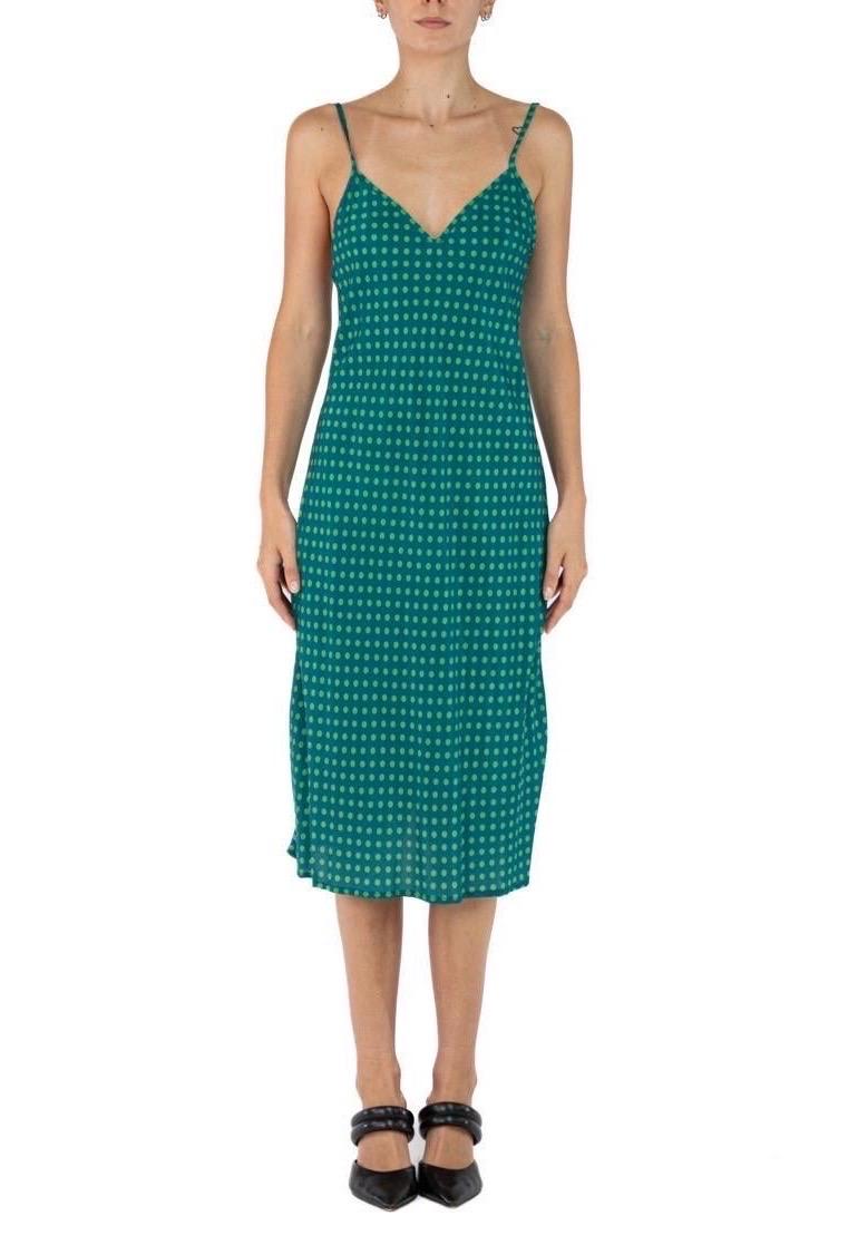 Morphew Collection Sea Green Polka Dot Novelty Print Cold Rayon Bias  Slip Dress
MORPHEW COLLECTION is made entirely by hand in our NYC Ateliér of rare antique materials sourced from around the globe. Our sustainable vintage materials represent over