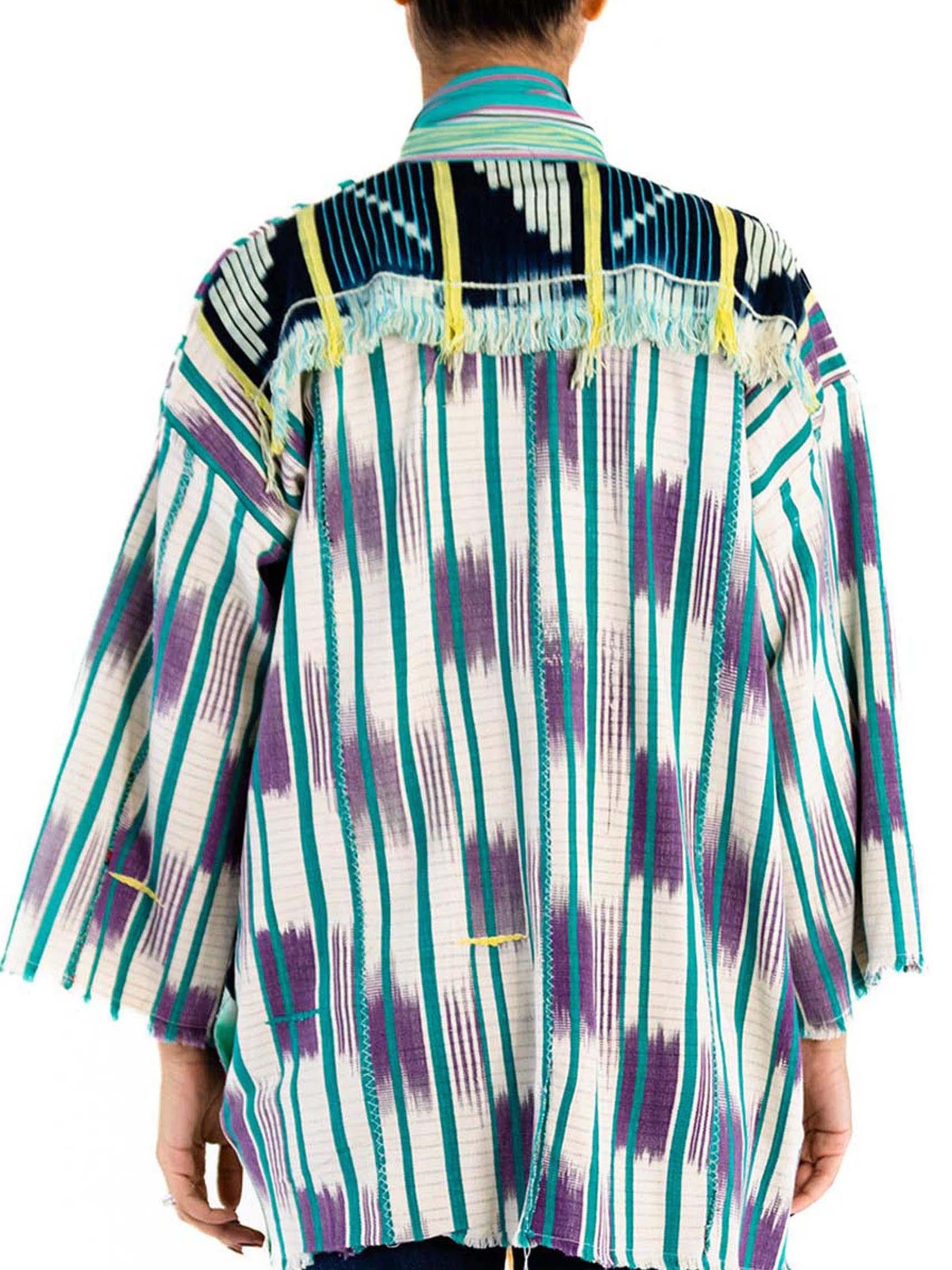 MORPHEW COLLECTION Doudoune en coton indigo d'Afrique de l'Ouest à bordures brodées multicolores en vente 4