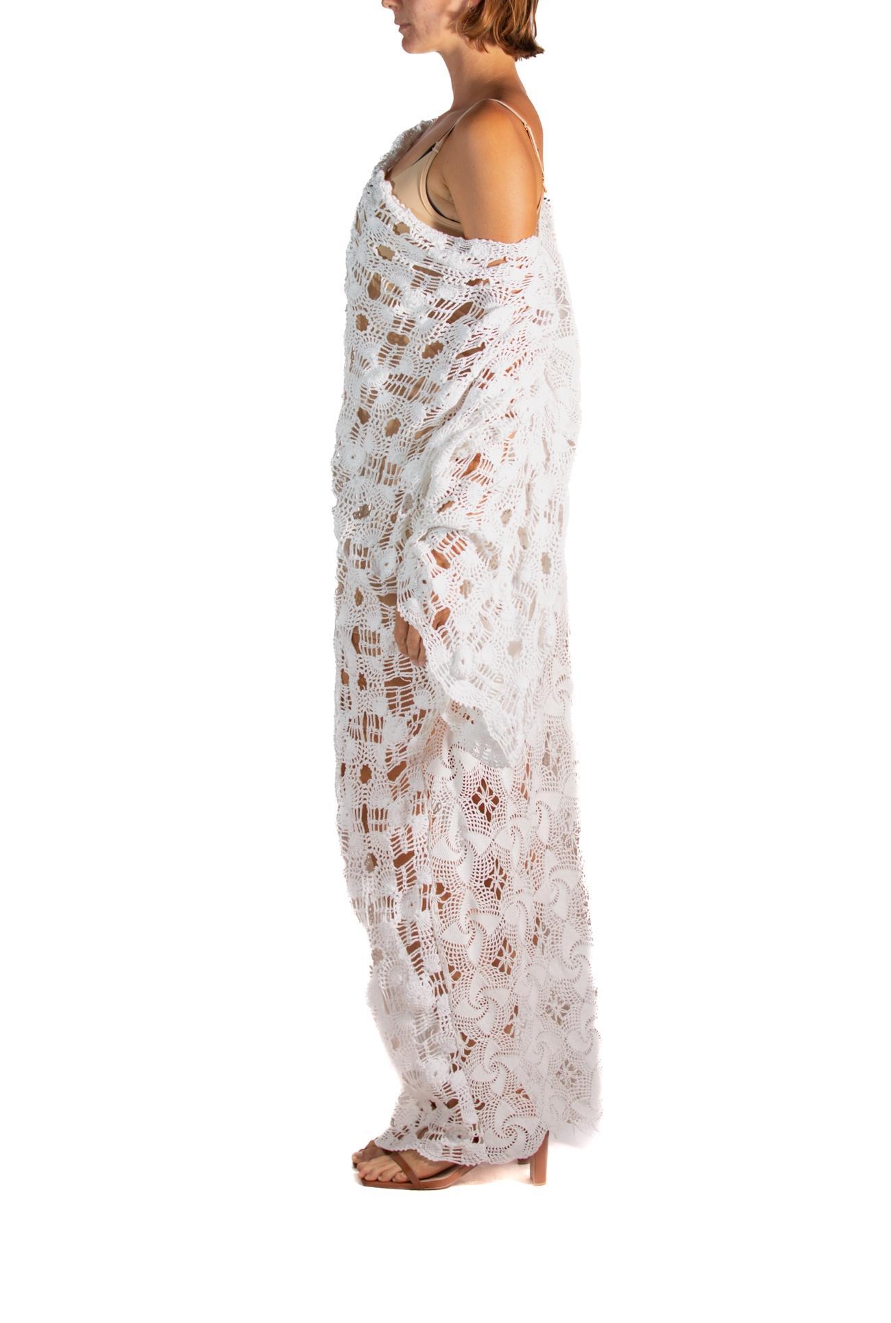 May take up to 2 weeks to ship.
Morphew Collection White Cotton Crochet Oversized Kaftan Dress
MORPHEW COLLECTION is made entirely by hand in our NYC Ateliér of rare antique materials sourced from around the globe. Our sustainable vintage materials