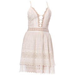 MORPHEW COLLECTION White Cotton Victorian Lace Mini Dress With Cutout Bow Front