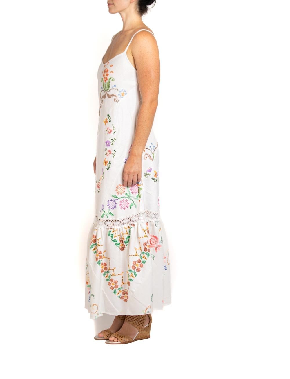 MORPHEW COLLECTION White & Floral Hand Embroidered Fabric From France Dress
MORPHEW COLLECTION is made entirely by hand in our NYC Ateliér of rare antique materials sourced from around the globe. Our sustainable vintage materials represent over a
