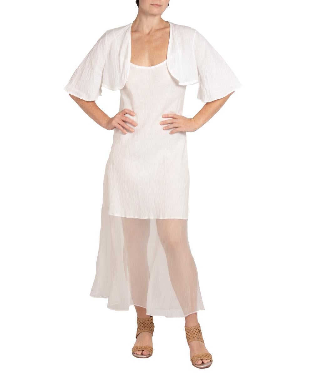 MORPHEW COLLECTION White Linen Bias Cut Dress With Jacket
MORPHEW COLLECTION is made entirely by hand in our NYC Ateliér of rare antique materials sourced from around the globe. Our sustainable vintage materials represent over a century of design,