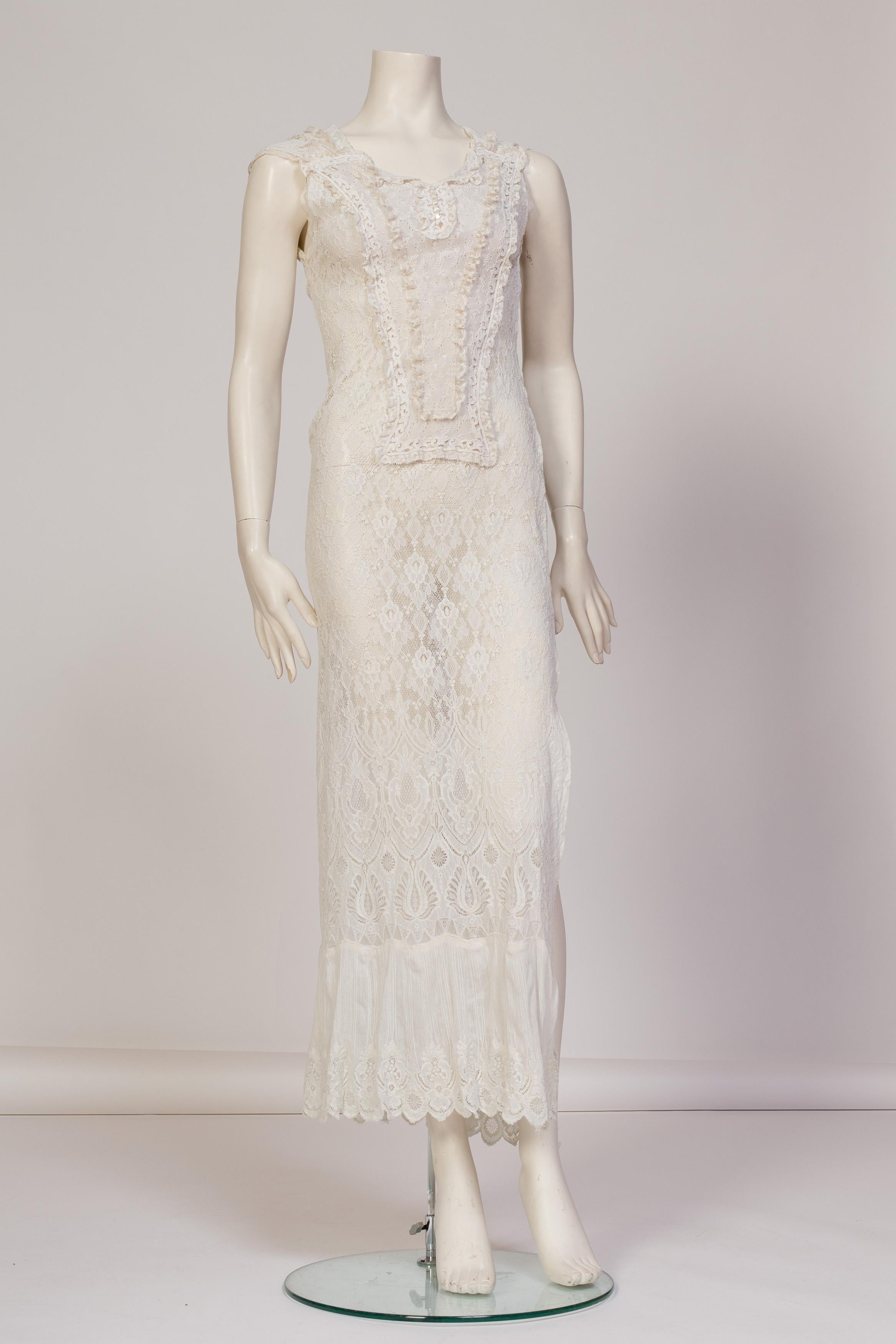 MORPHEW COLLECTION White Maxi Resort Dress Made From Edwardian & 1930'S Lace
MORPHEW COLLECTION is made entirely by hand in our NYC Ateliér of rare antique materials sourced from around the globe. Our sustainable vintage materials represent over a