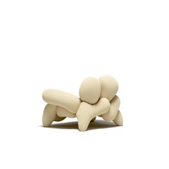 Poltrona Morphologica Cream in lana bouclé di Misha Kahn