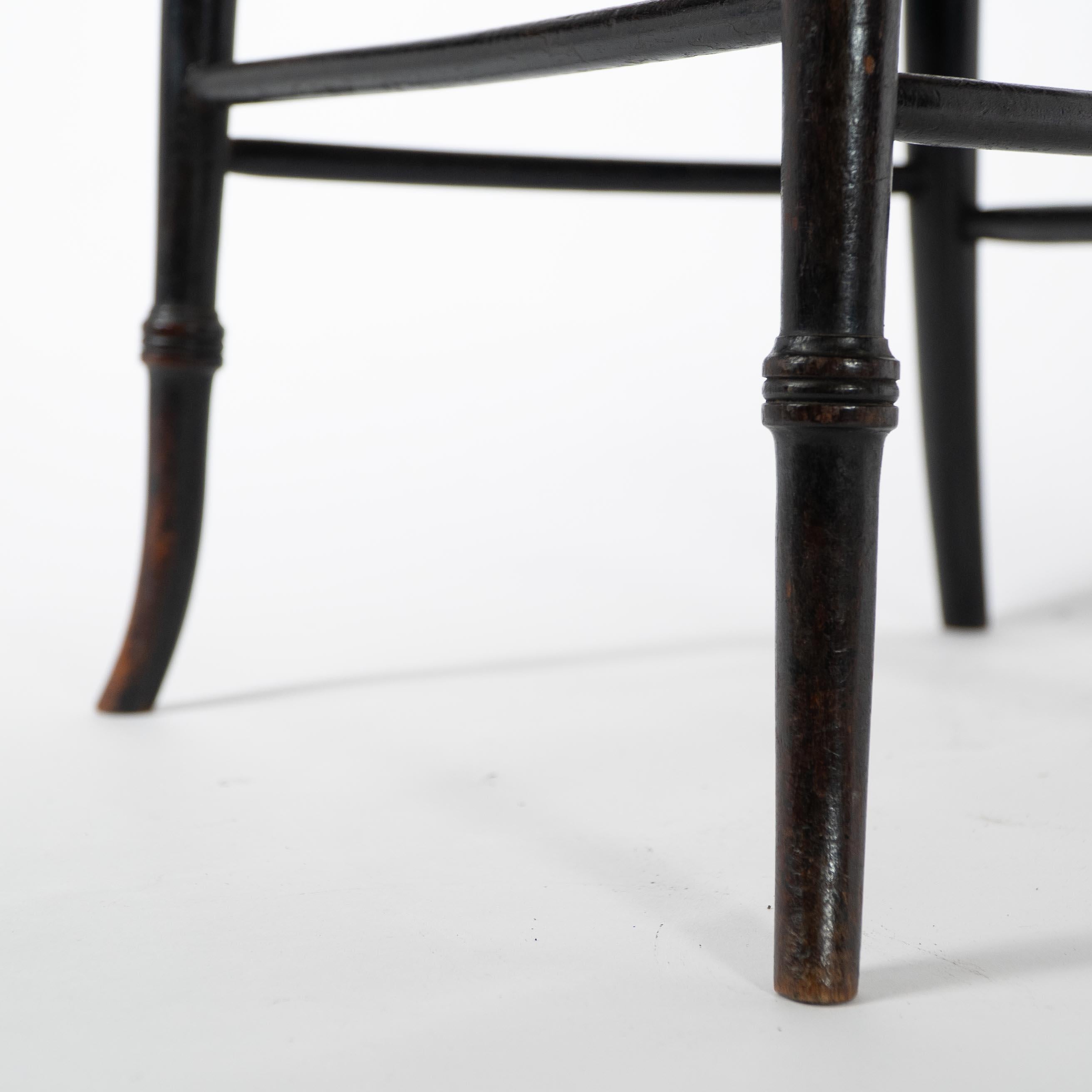 Morris and Co. An Aesthetic Movement cane seated armchair For Sale 5