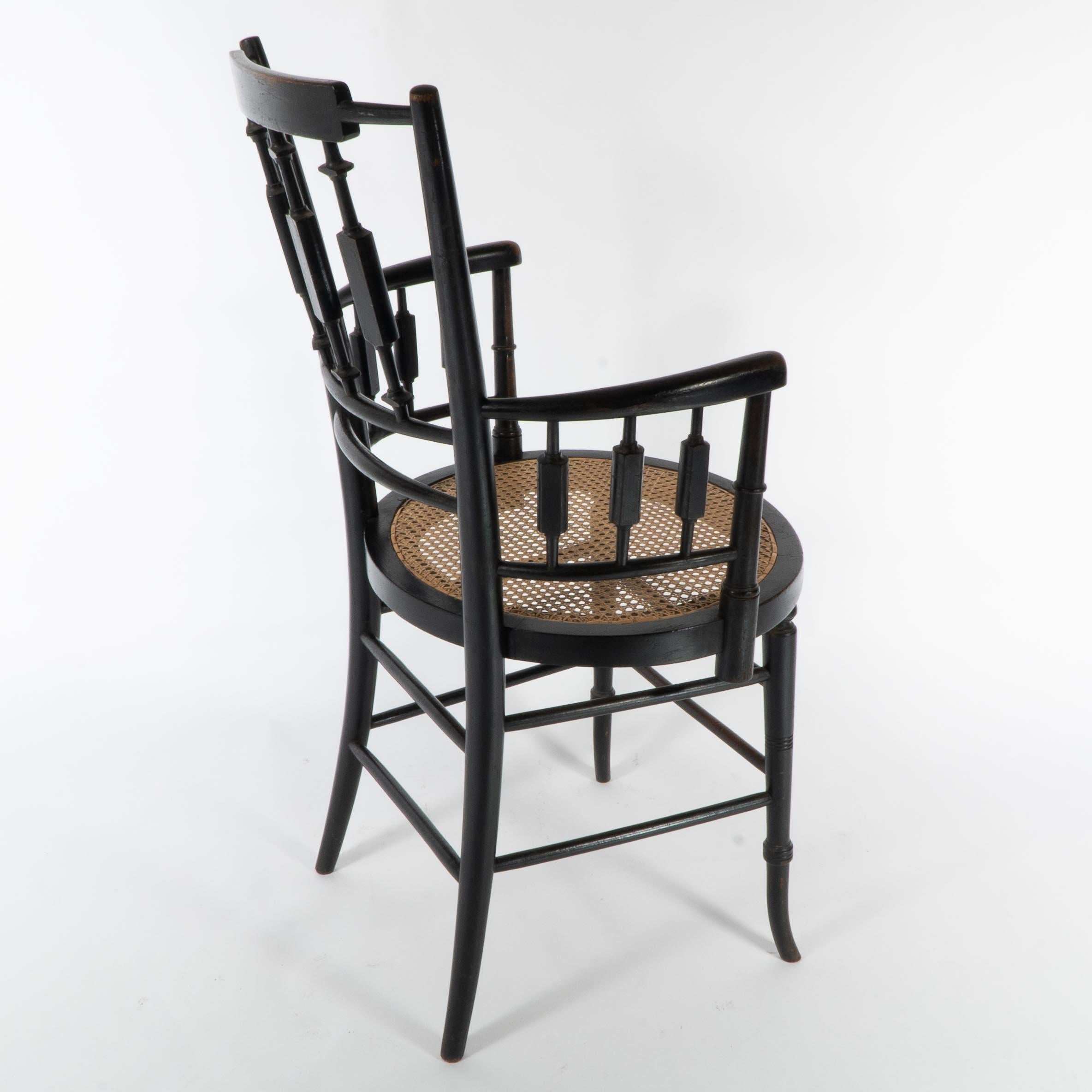 Morris and Co. An Aesthetic Movement cane seated armchair For Sale 6
