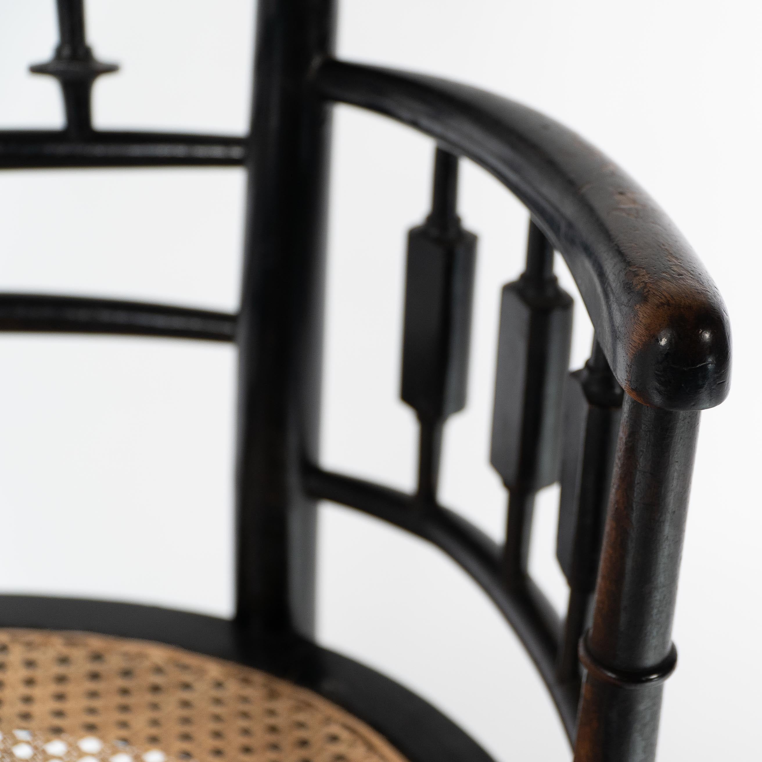 Morris and Co. An Aesthetic Movement cane seated armchair For Sale 1