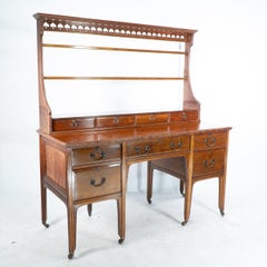 Morris and Co attributed. A subtle Anglo-Japanese walnut sideboard dresser