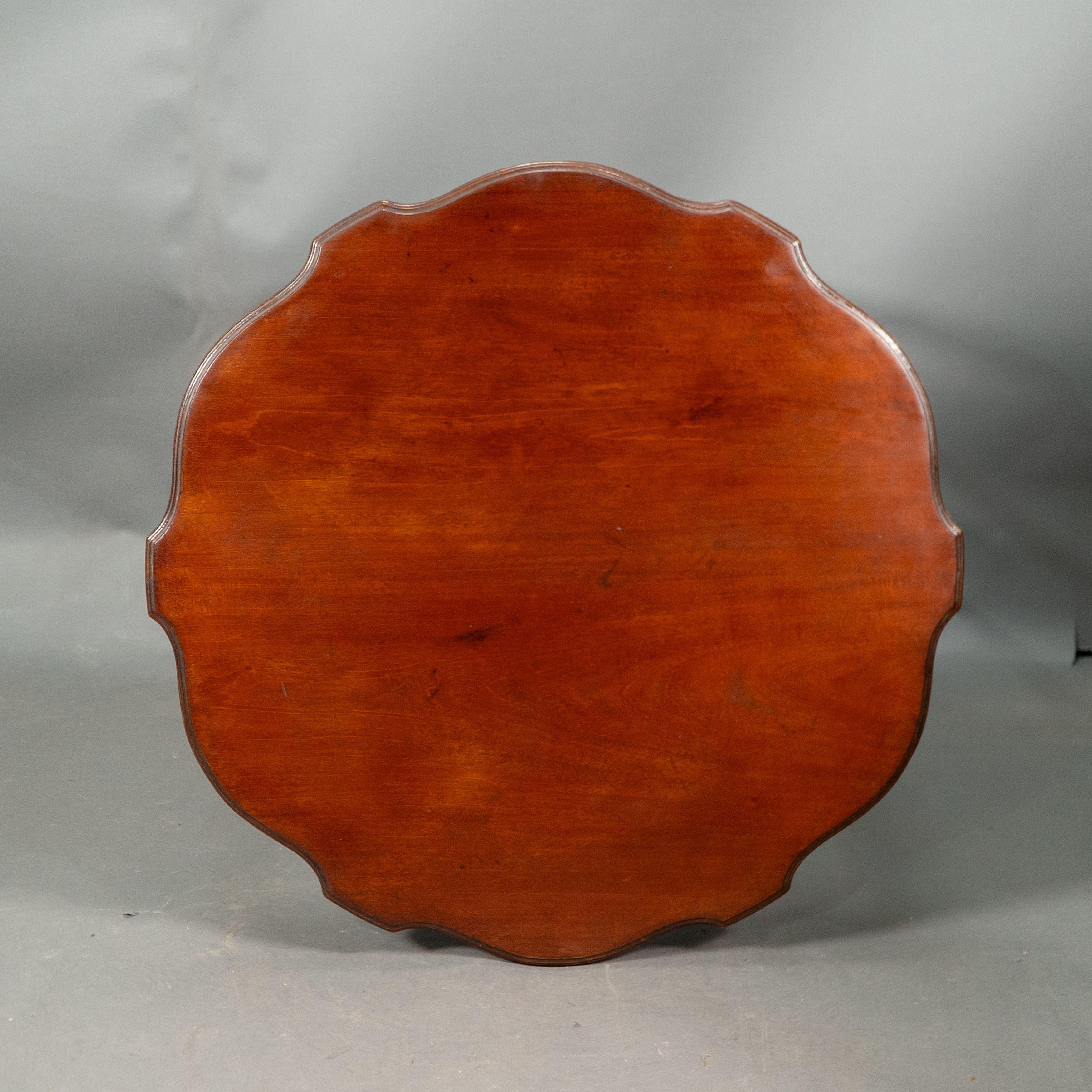 Morris and Co. Walnut side table with a shaped top and a wavey apron. For Sale 4
