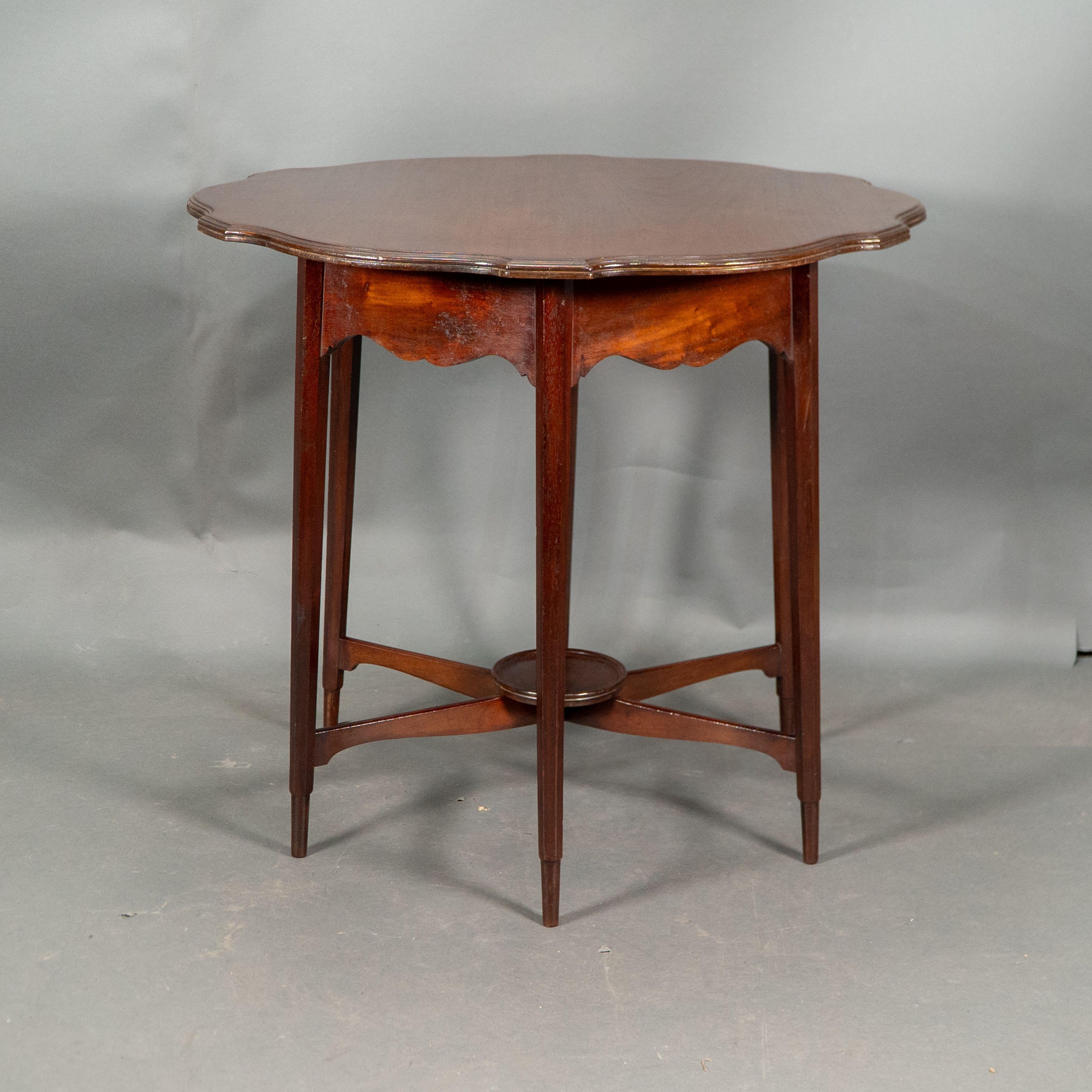 Morris and Co. Walnut side table with a shaped top and a wavey apron. For Sale 2