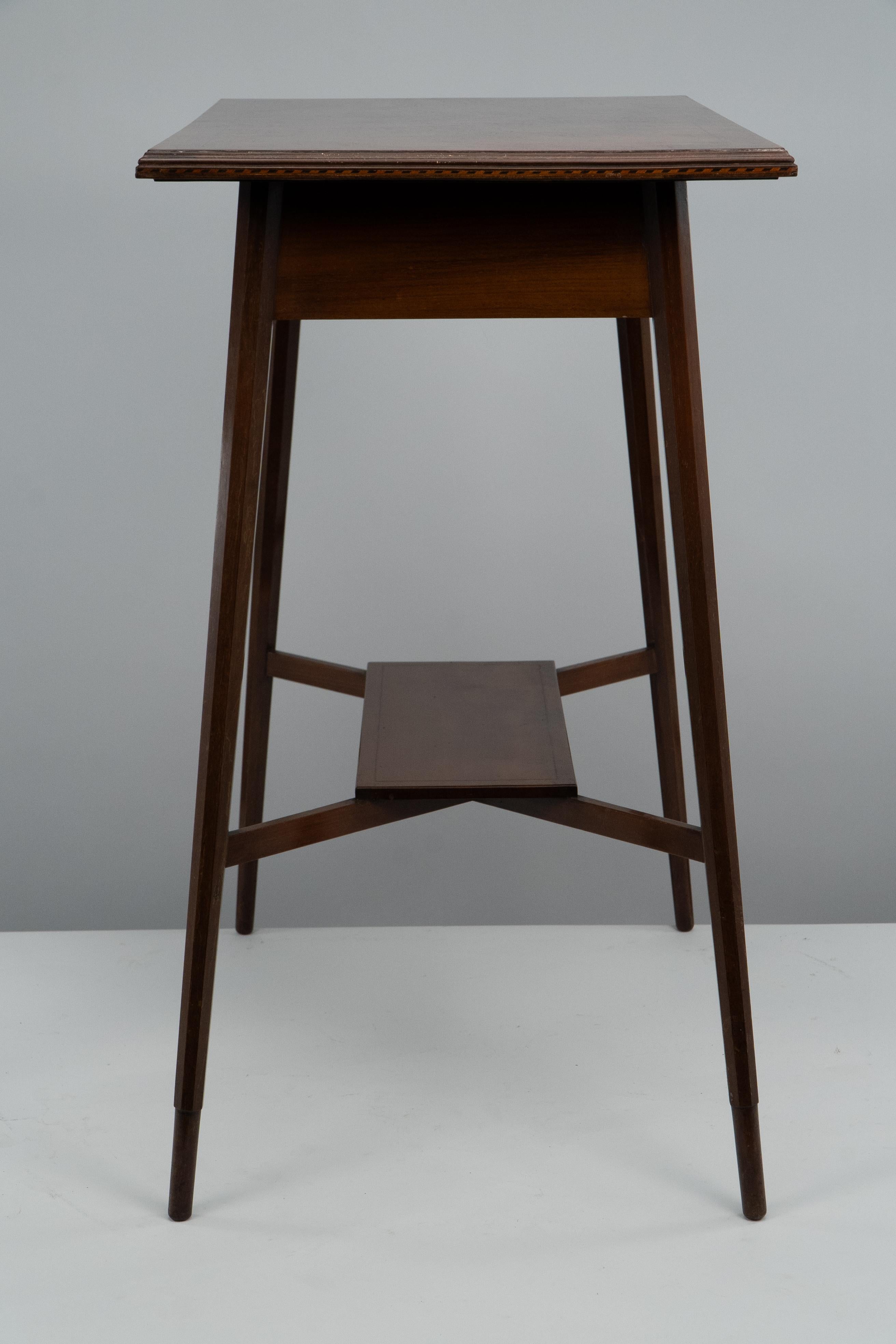 Morris & Co. A fine quality Aesthetic Movement walnut side table. In Good Condition For Sale In London, GB