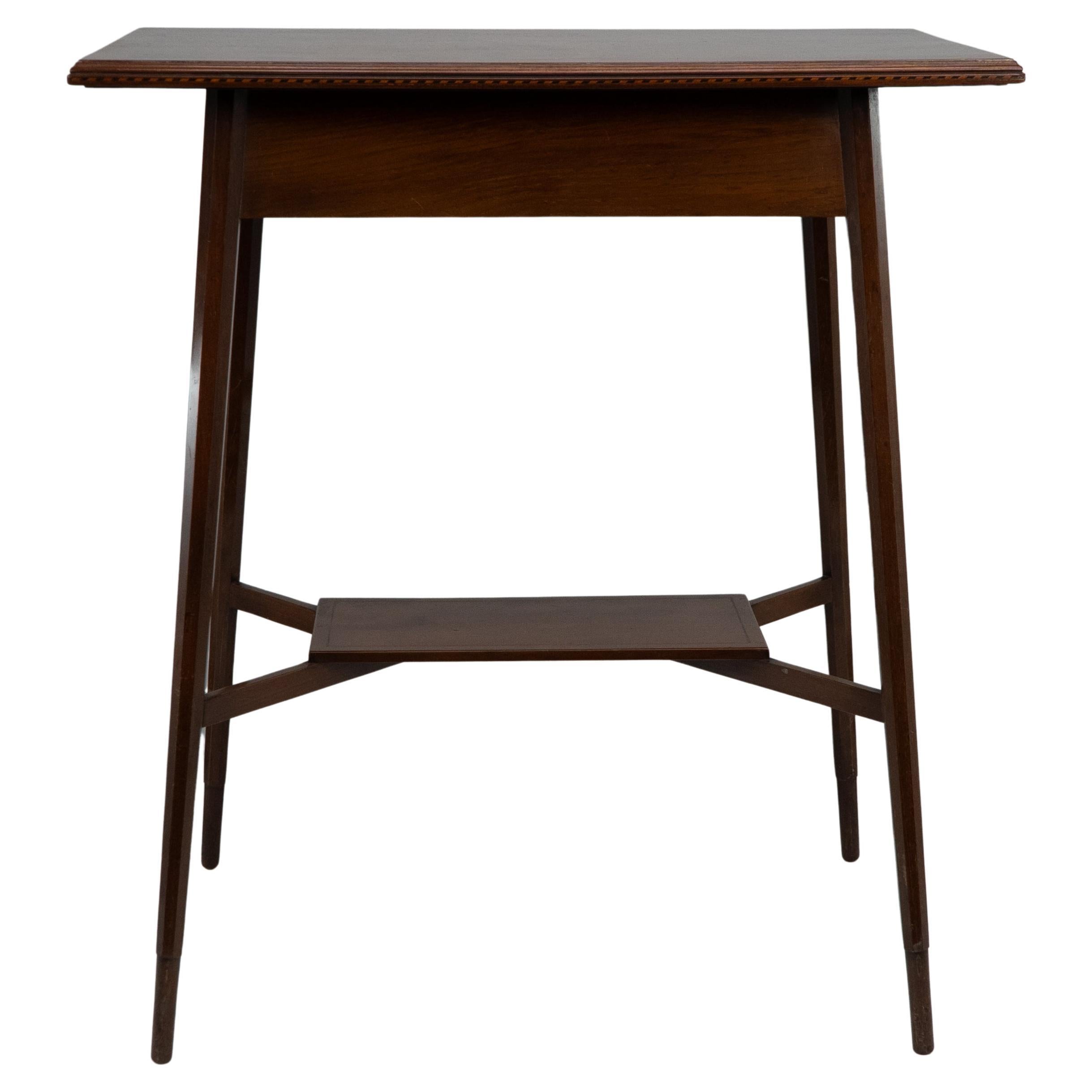 Morris & Co. A fine quality Aesthetic Movement walnut side table. For Sale