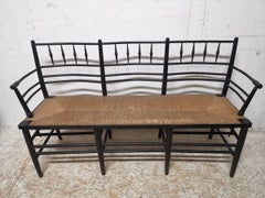 Morris & Co. an Arts & Crafts Museum Quality Ebonised Sussex Three-Seat Settee