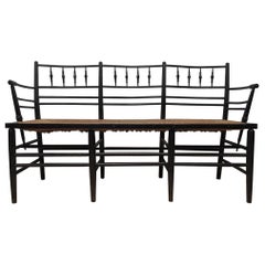 Morris & Co. an Arts & Crafts Museum Quality Ebonised Sussex Three-Seat Settee