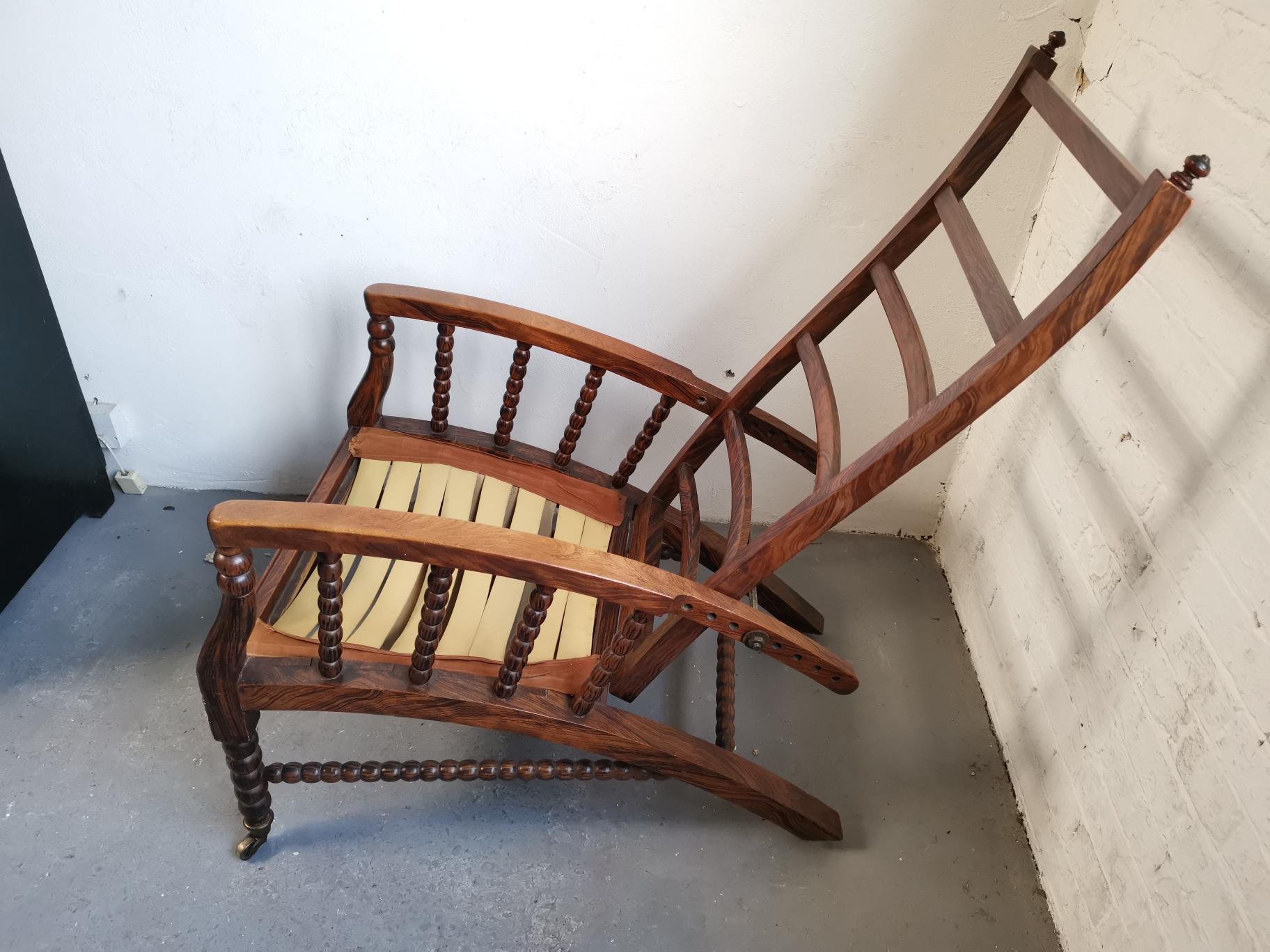Morris & Co. attributed, after a design by Phillip Webb.
An aesthetic movement adjustable reclining armchair with original painted simulated rosewood effect.
Ready for the upholstery of your choice. We can provide an upholstery service if