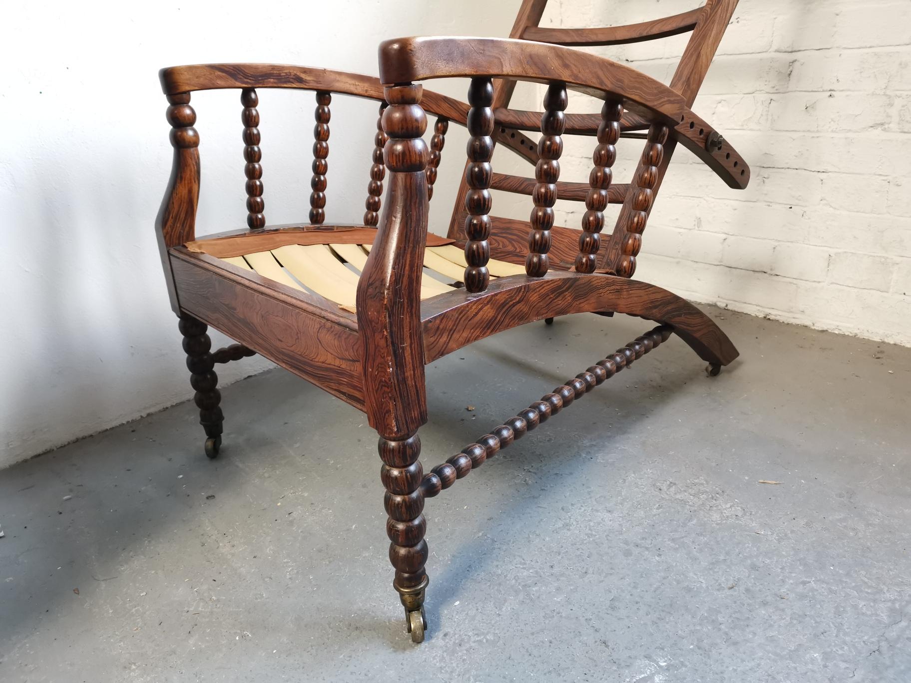 Rosewood Morris & Co Attributed, an Aesthetic Movement Reclining Armchair for Upholstery