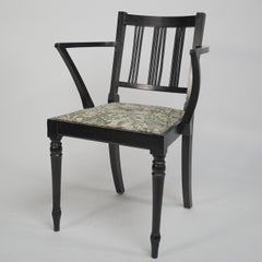 Morris & Co attributed. An Arts & Crafts beech armchair with Morris fabric seat.