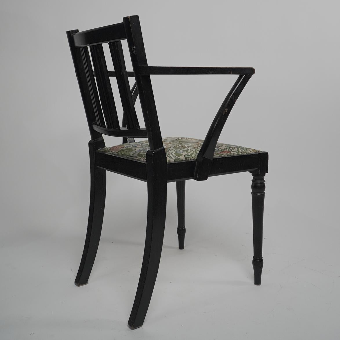 Early 20th Century Morris & Co attributed. An Arts & Crafts beech armchair with Morris fabric seat. For Sale
