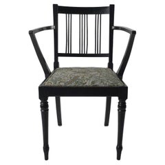 Morris & Co attributed. An Beech armchair with Morris fabric seat
