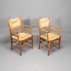 Morris & Co attributed to Philip Webb. A scarce pair of Beech Sussex Armchairs