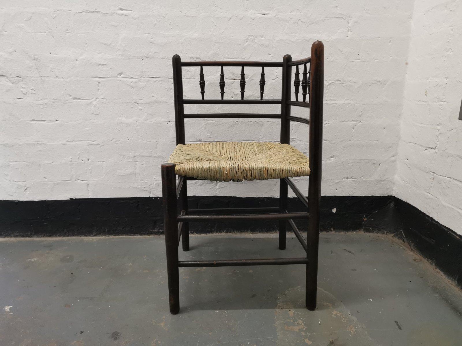 Ebonized Morris & Co, Attributed to Phillip Webb, A Rare Sussex Rush Seat Corner Chair