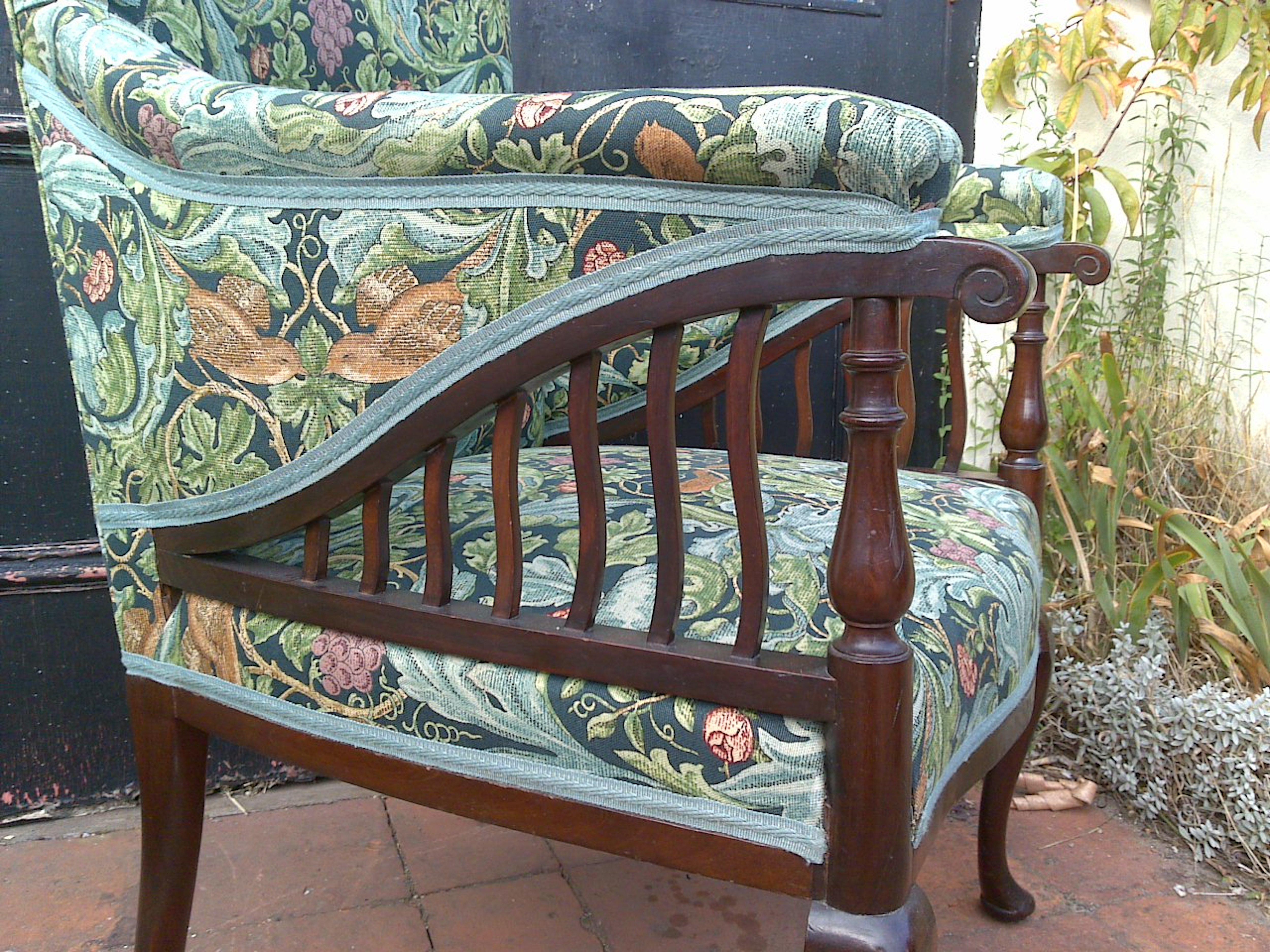 Morris and Co. George Jack,. attributed.
An Aesthetic Movement mahogany armchair, we have had professionally re upholstered in a quality Morris and Co 'cabbage and vine fabric.