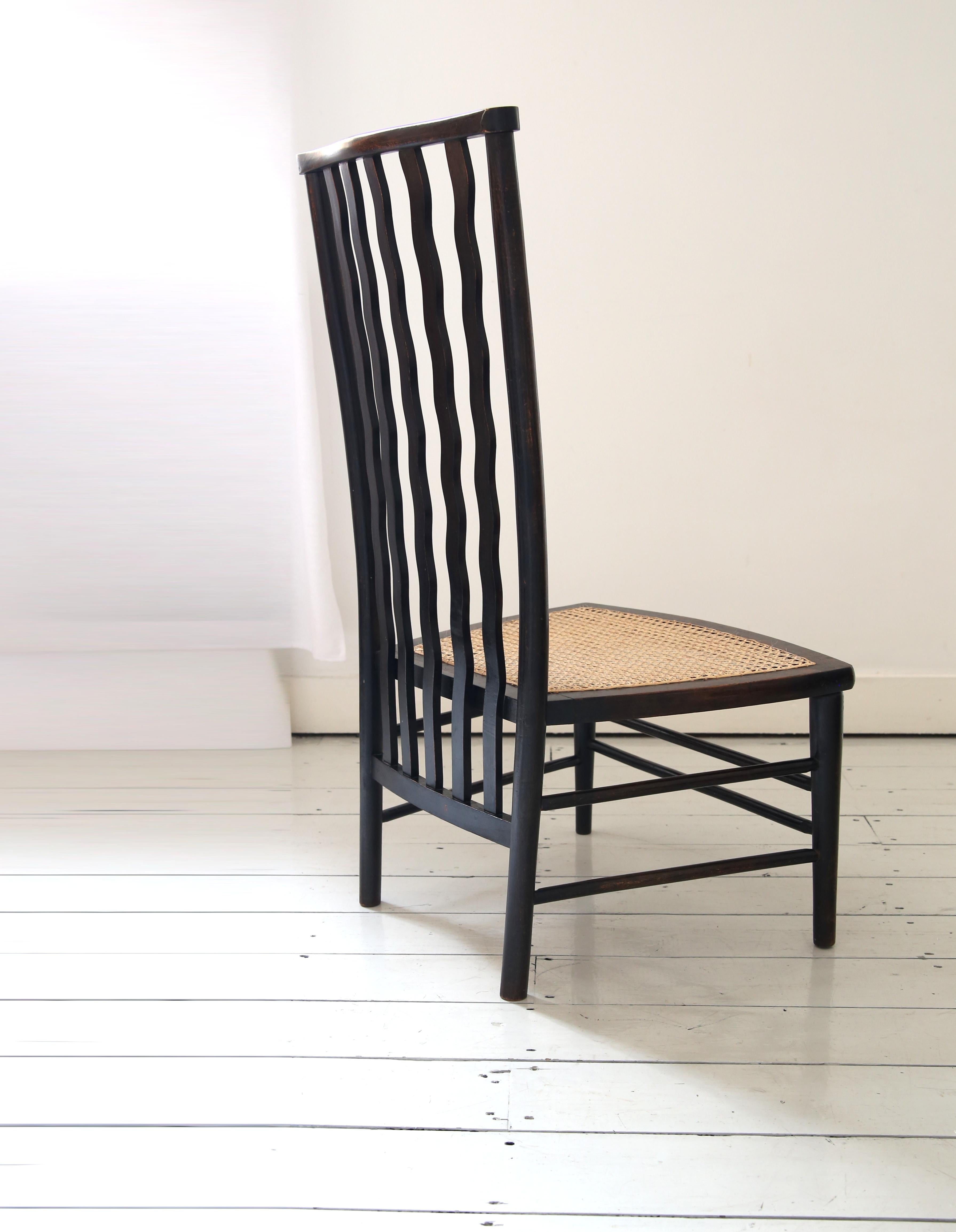 Morris & Co Lath back Chair for Liberty with a cane seat 4