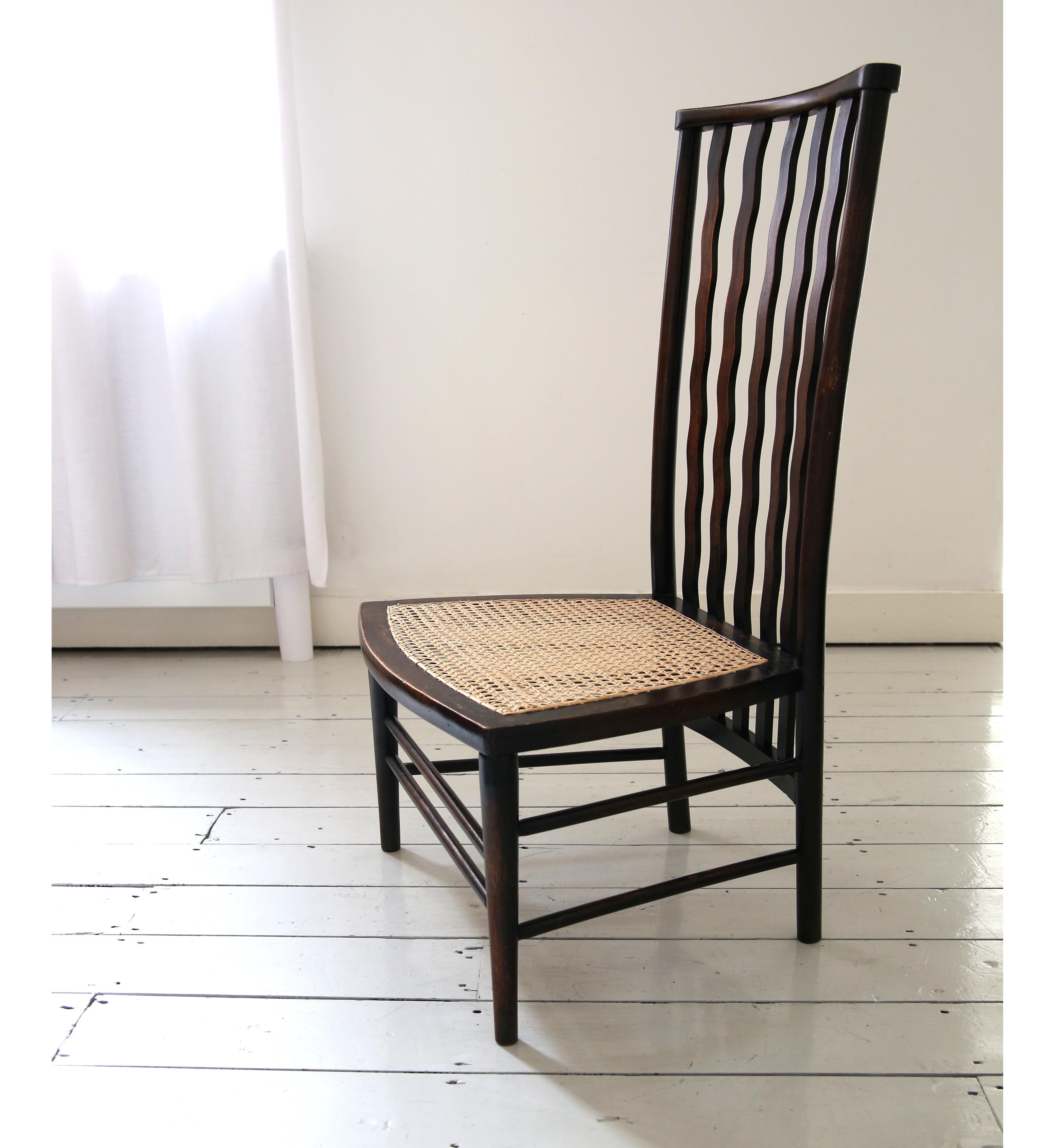 British Morris & Co Lath back Chair for Liberty with a cane seat