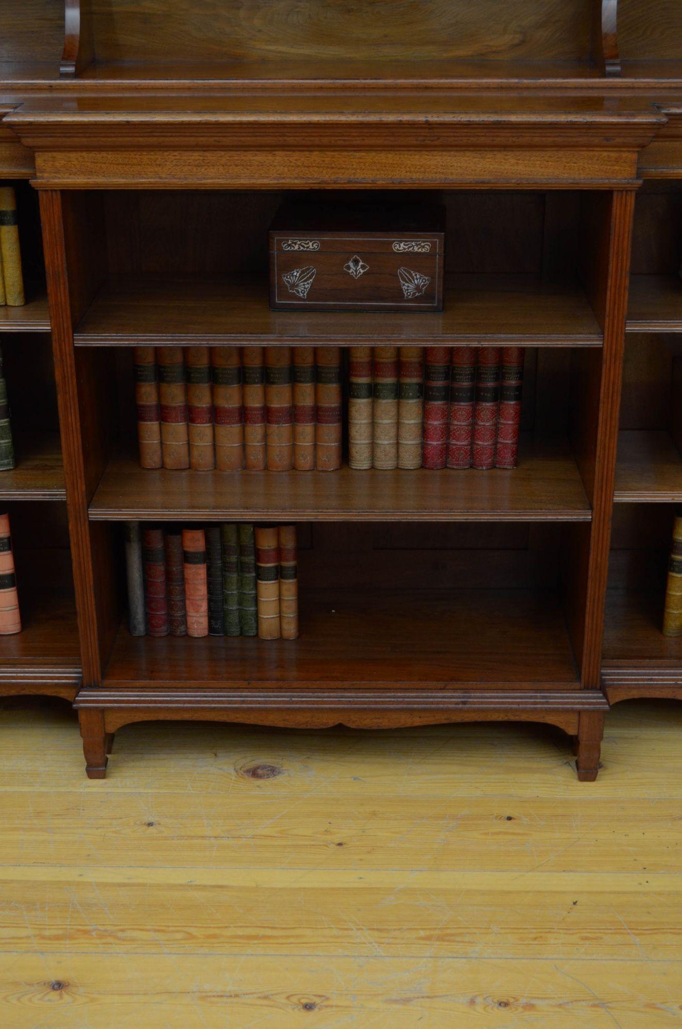 A quality walnut bookcase by Morris and co, designed by George Jack 6
