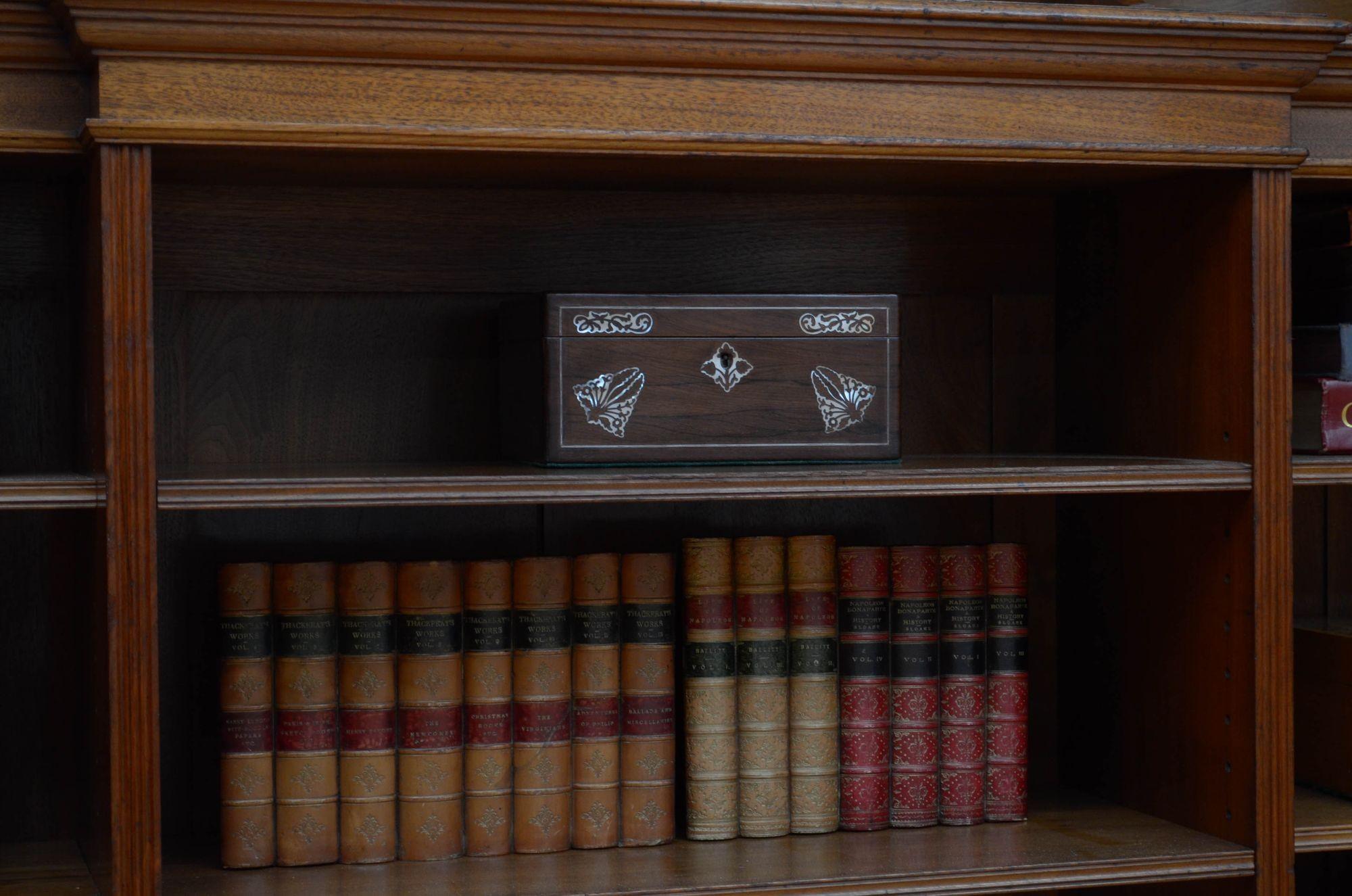 A quality walnut bookcase by Morris and co, designed by George Jack 8