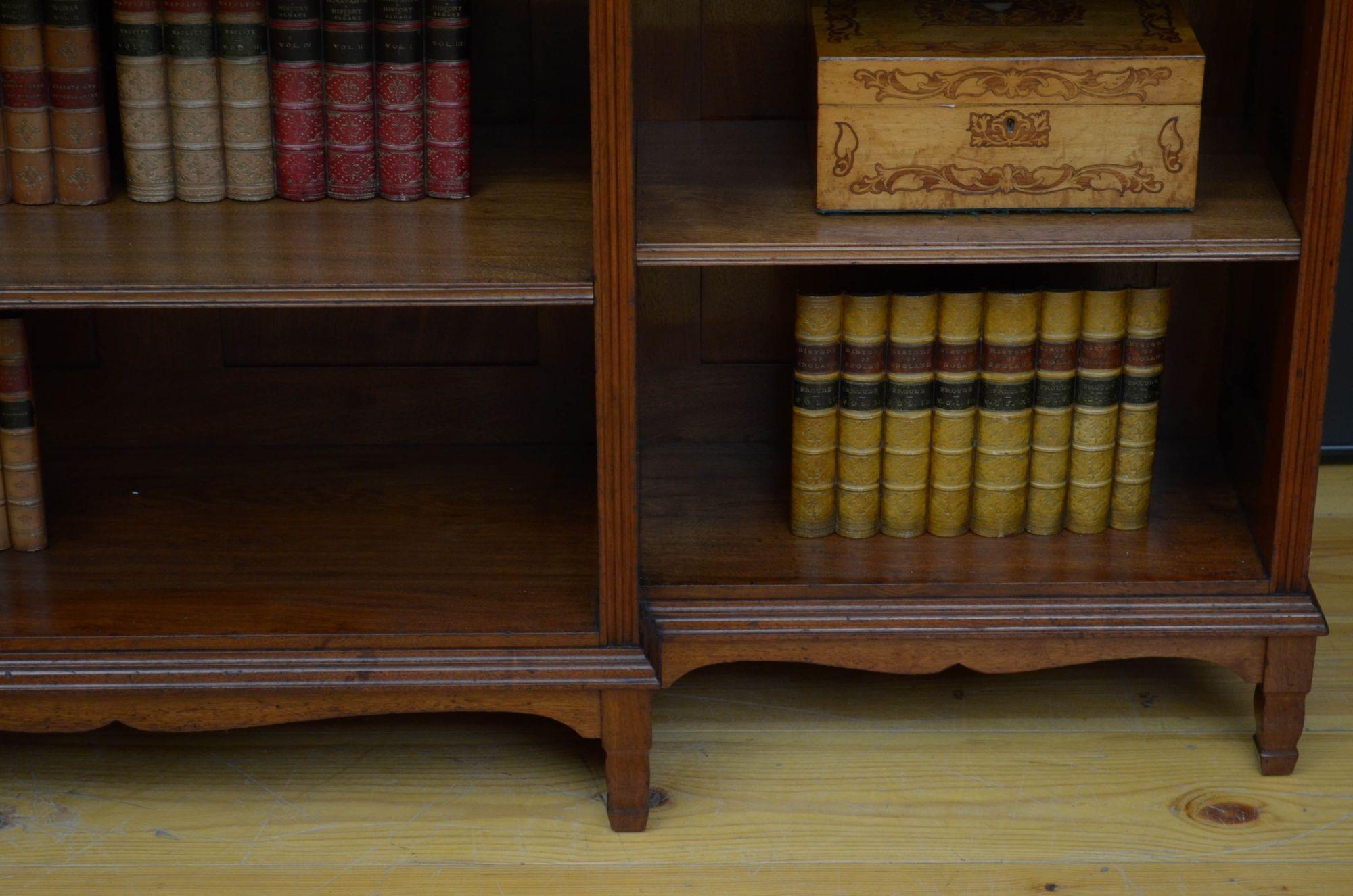 A quality walnut bookcase by Morris and co, designed by George Jack 10