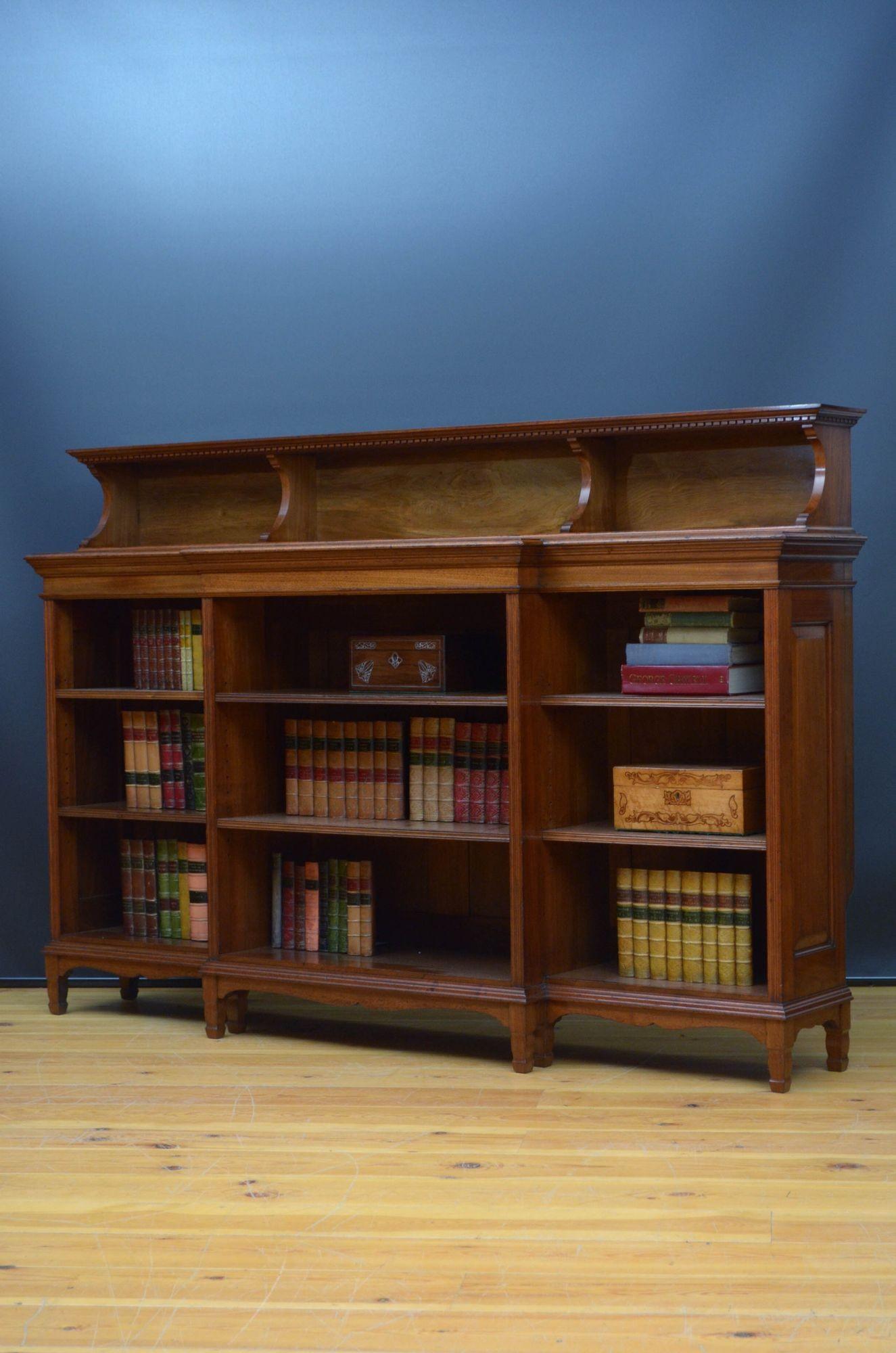 A quality walnut bookcase by Morris and co, designed by George Jack In Good Condition In Whaley Bridge, GB