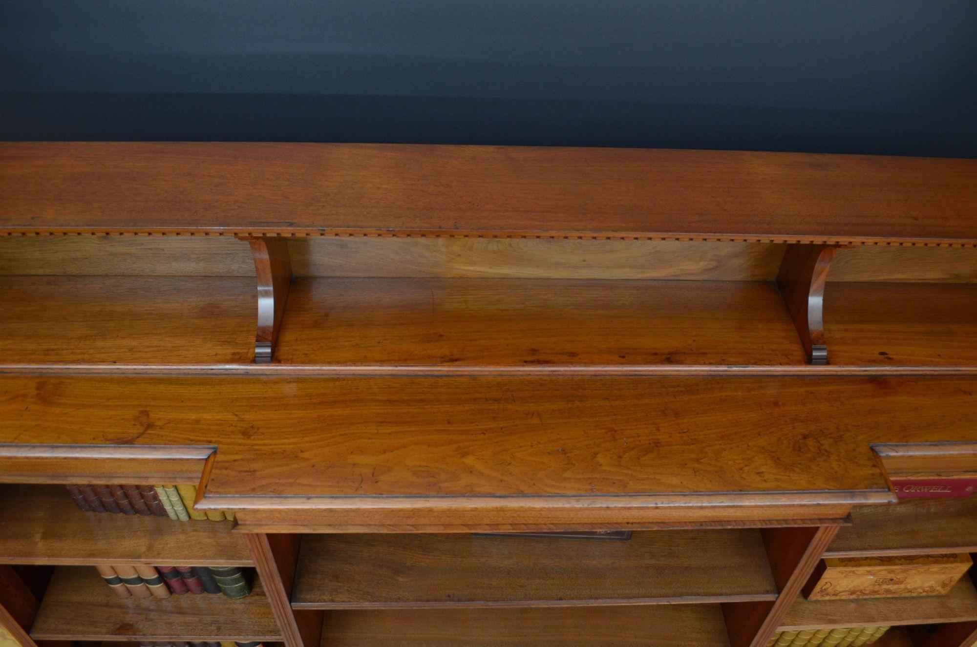 Walnut A quality walnut bookcase by Morris and co, designed by George Jack