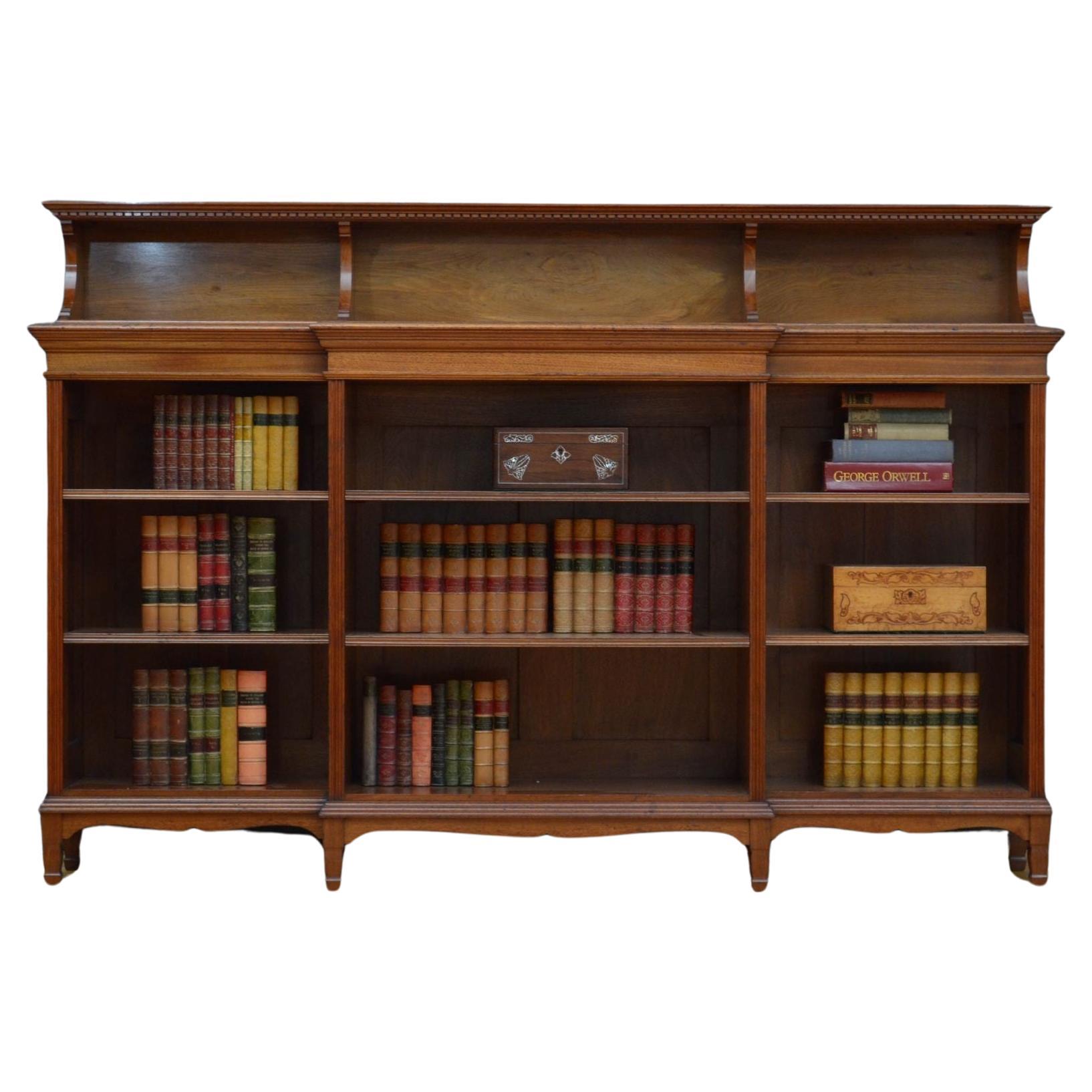 A quality walnut bookcase by Morris and co, designed by George Jack