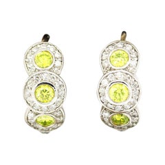 Morris 
David 14 Karat White Gold 1.60 Carat Yellow Diamond Huggie Earrings