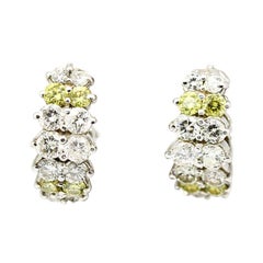 Morris 
David 14 Karat White Gold 3.24 Carat Yellow Diamond Huggie Earrings
