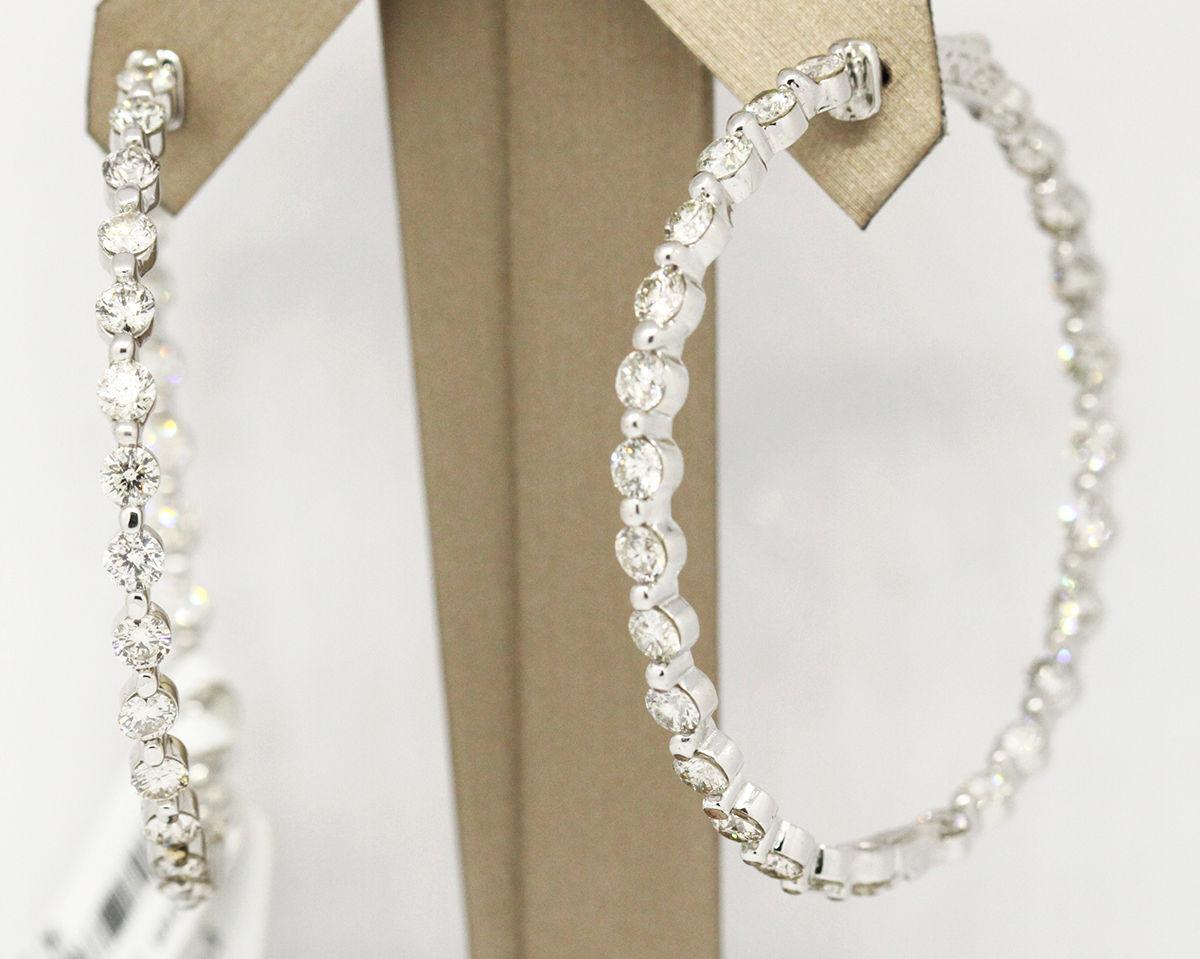 Morris & David 14k White Gold 8.32tcw Diamond Large Hoop Earrings
Metal: 14k White Gold 
Stone: Diamonds
Diamond Color:	I,J,M
Clarity:	VS1-Si1
Stone Shape: Round
TCW: 8.32
Weight: 16g