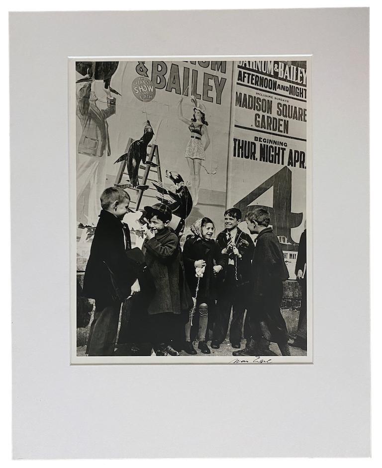 Kids with Circus Poster, NYC - Photograph by Morris Engel