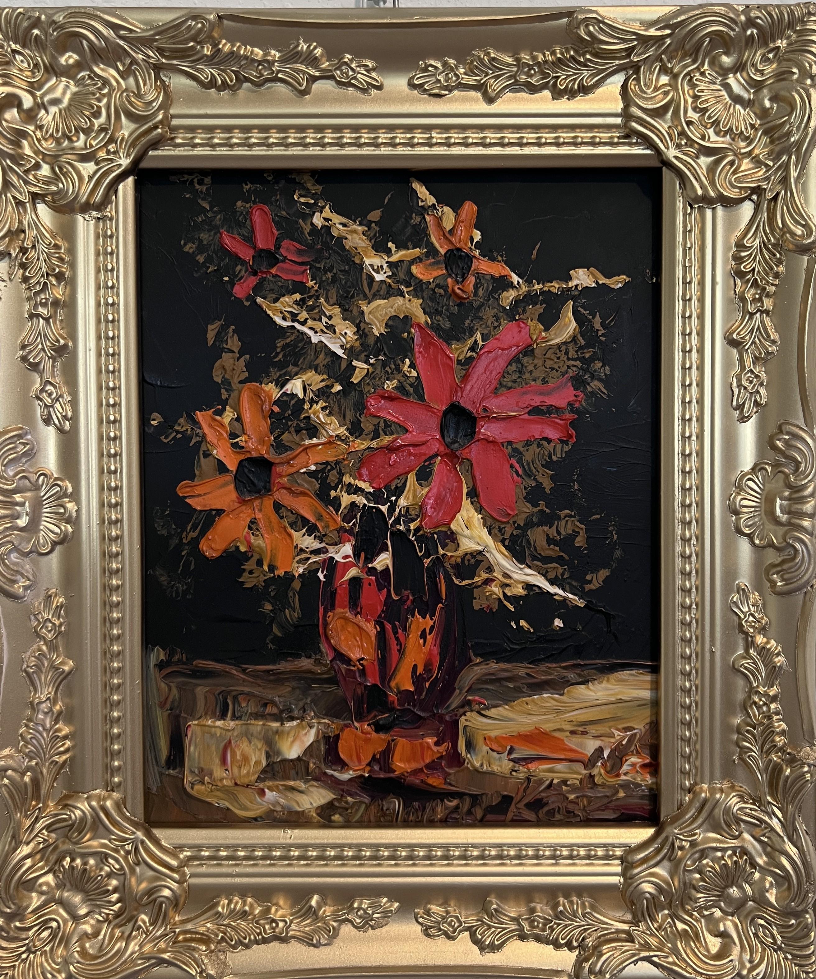 This vibrant oil painting by celebrated artist Morris Katz features a striking floral still life rendered with his signature impasto palette knife technique. Bold red and orange petals burst from a vase against a dramatic black background, creating