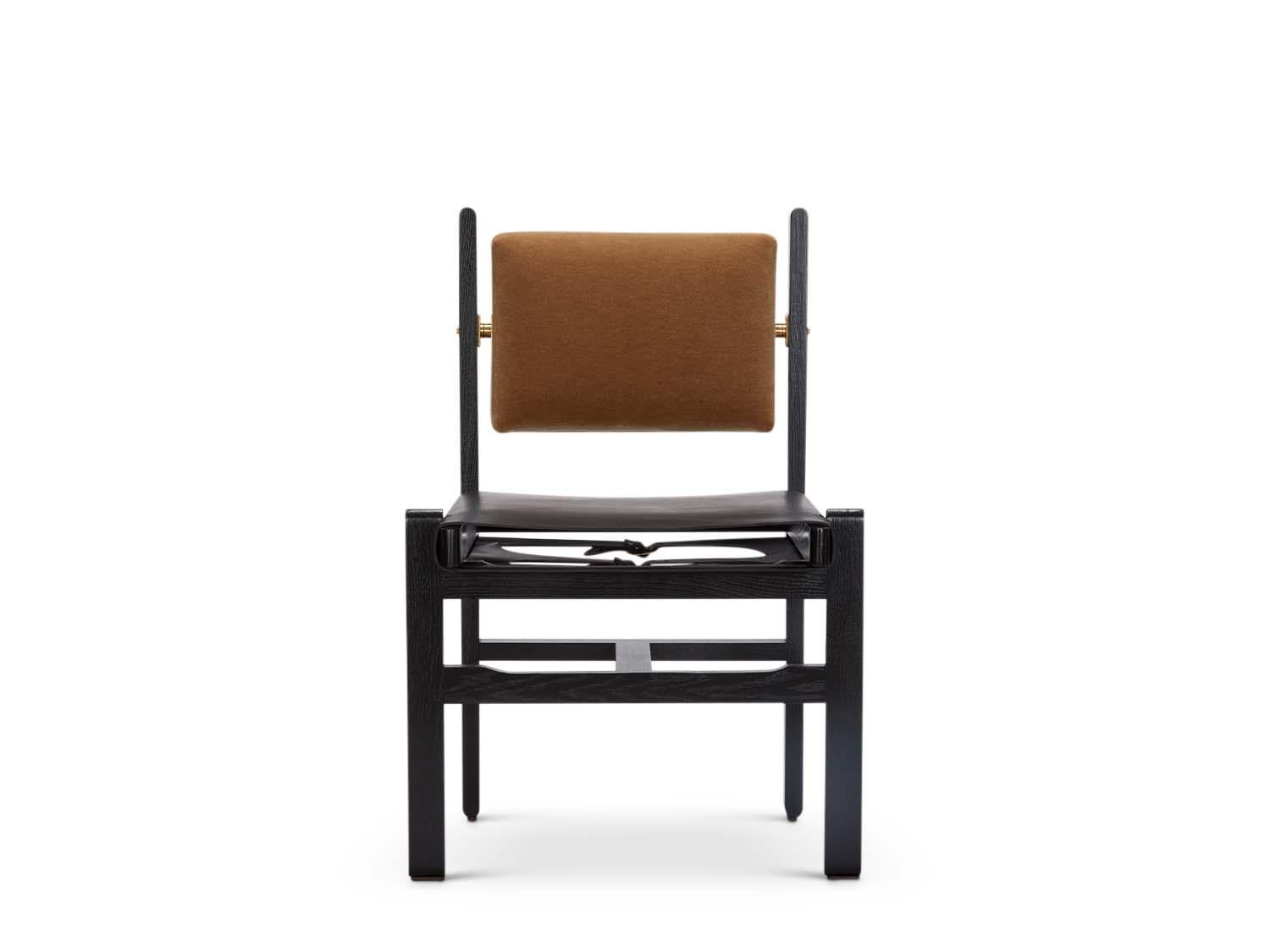 The Morro Dining Side Chair is made from a solid American walnut or white oak frame and features an upholstered back cushion and a leather sling seat.

The Lawson-Fenning Collection is designed and handmade in Los Angeles, California. Reach out to